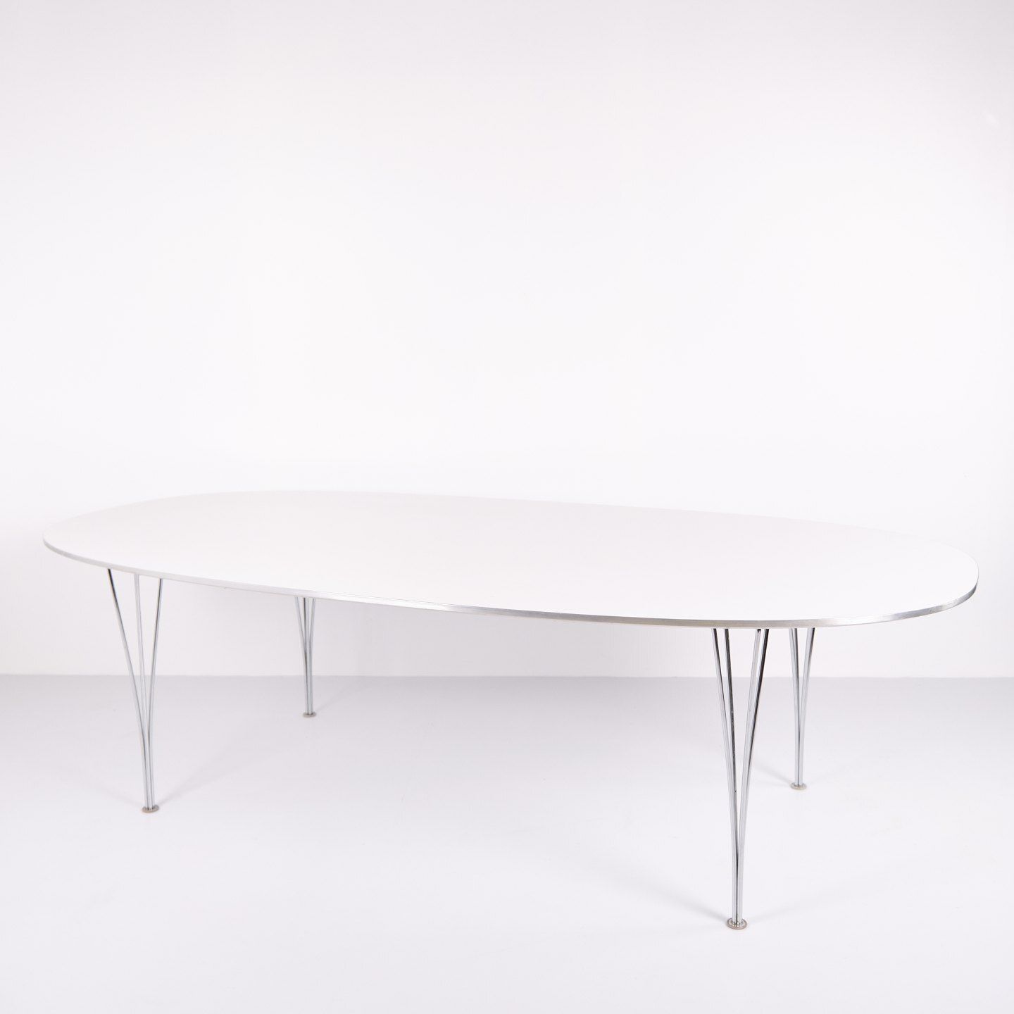 Super Ellipse Dining Table   Model B614   White Laminate   Piet Hein, Bruno Mathsson & Arne Jacobsen   Fritz Hansen photo furniture