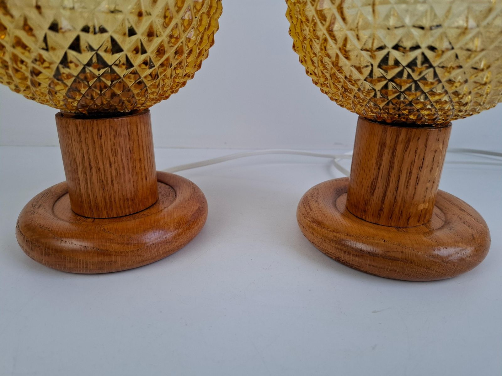 419.0 Pair Of Mid Century Table Lamps With Amber Glass And Wood Base, Czechoslovakia photo