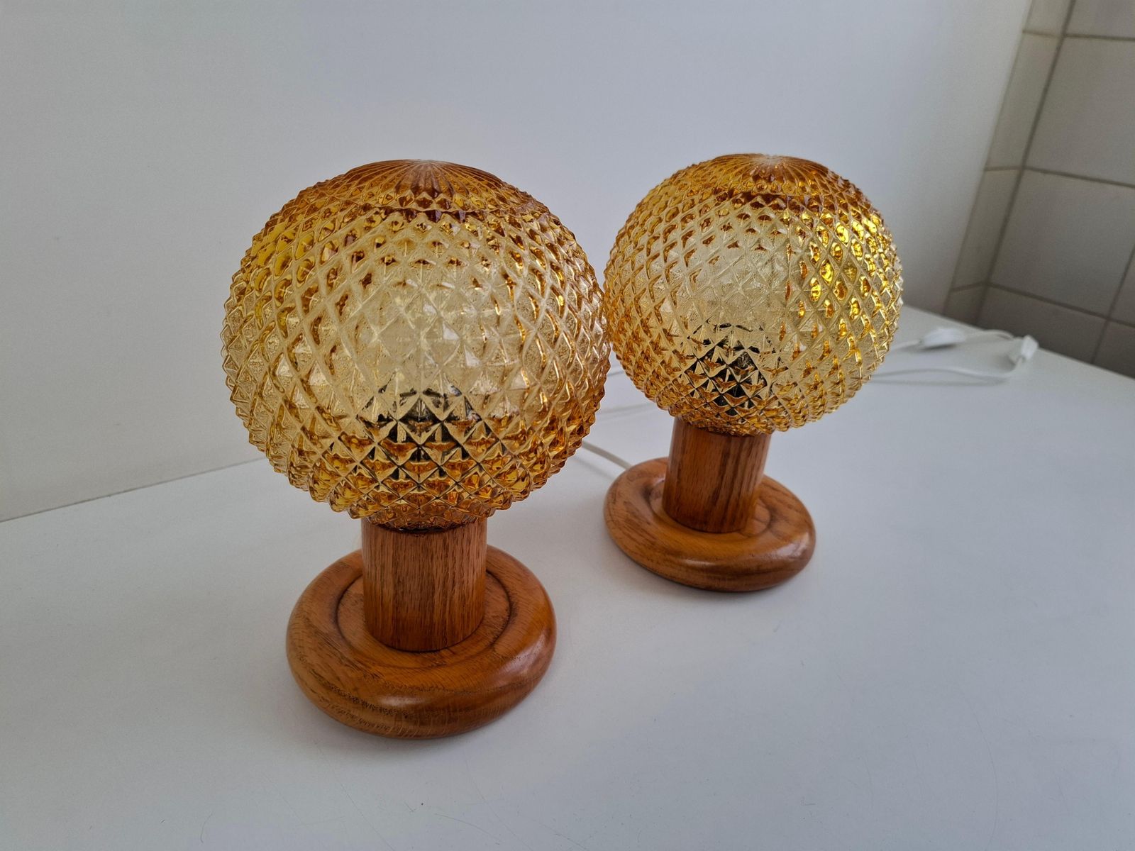 photo buy Pair Of Mid Century Table Lamps With Amber Glass And Wood Base, Czechoslovakia