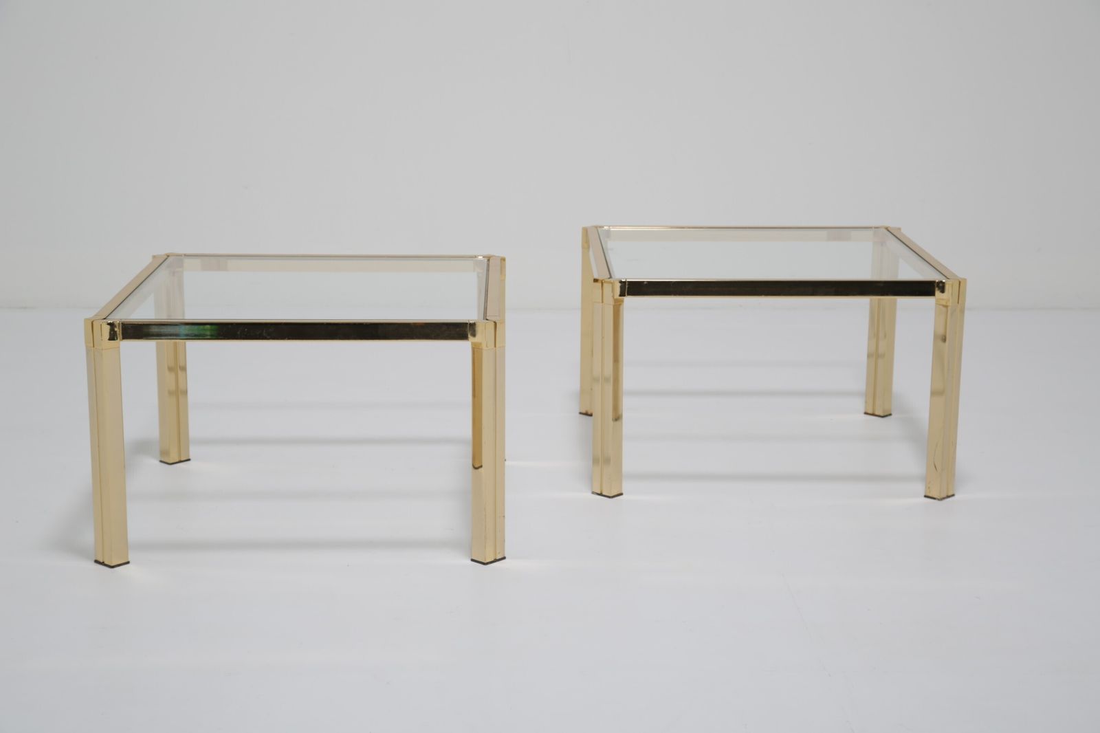 photo furniture Italian Pair Of Regency Modern Side Tables: Brass & Clear Glass, Italy, 1970s.