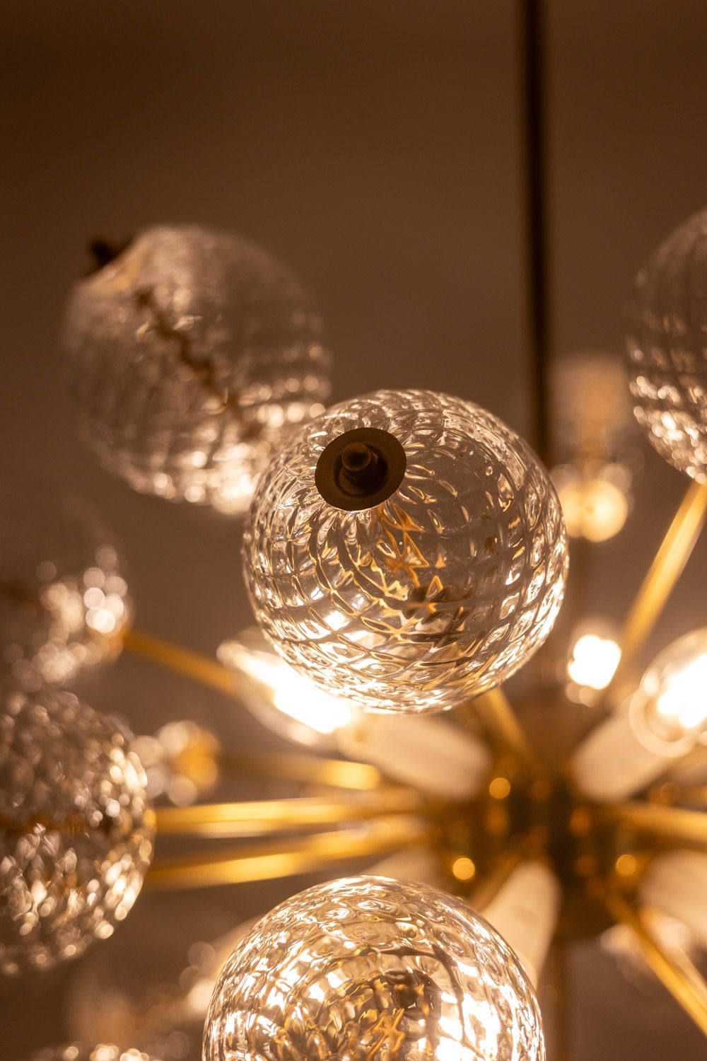 photo vinterior Kamenicky Senov, Published By. Pair Of Brass And Glass Chandeliers. Circa 1970.