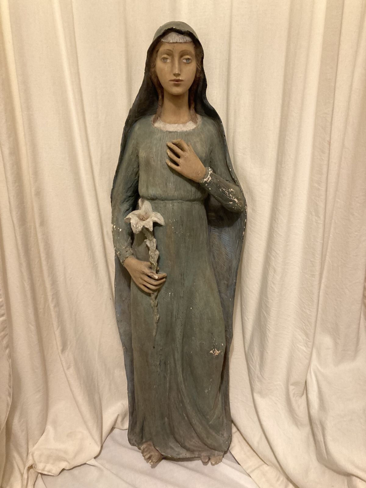 Antique Statue Of The Young Virgin Mary Holding A Lily.