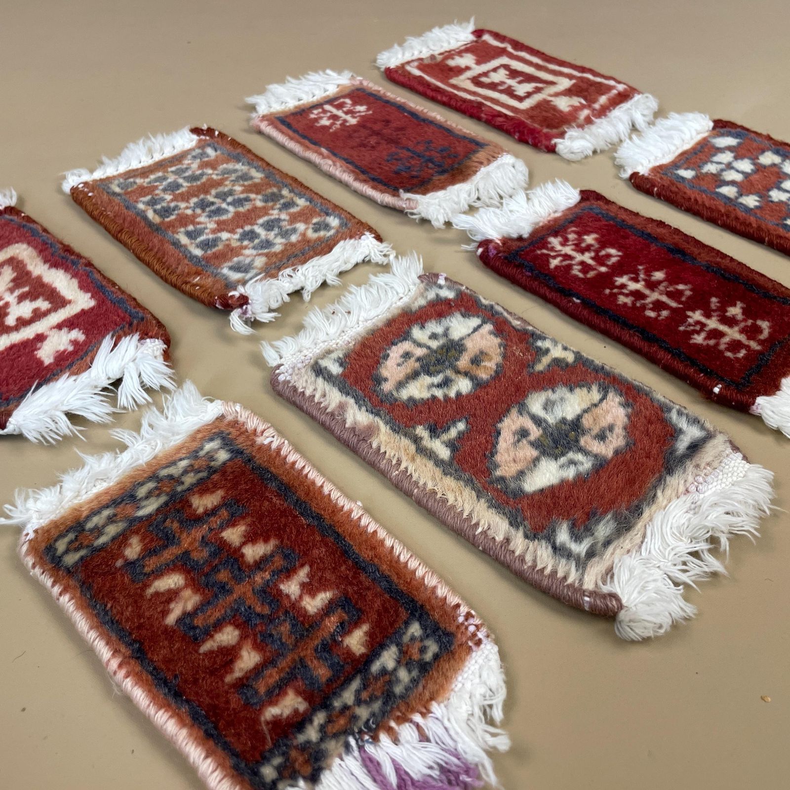 Vintage Miniature Oriental Rugs X8 Handwoven Wool Tabletop Decor Red Mats Set Geometric Small Carpets White Tassels photo for sale