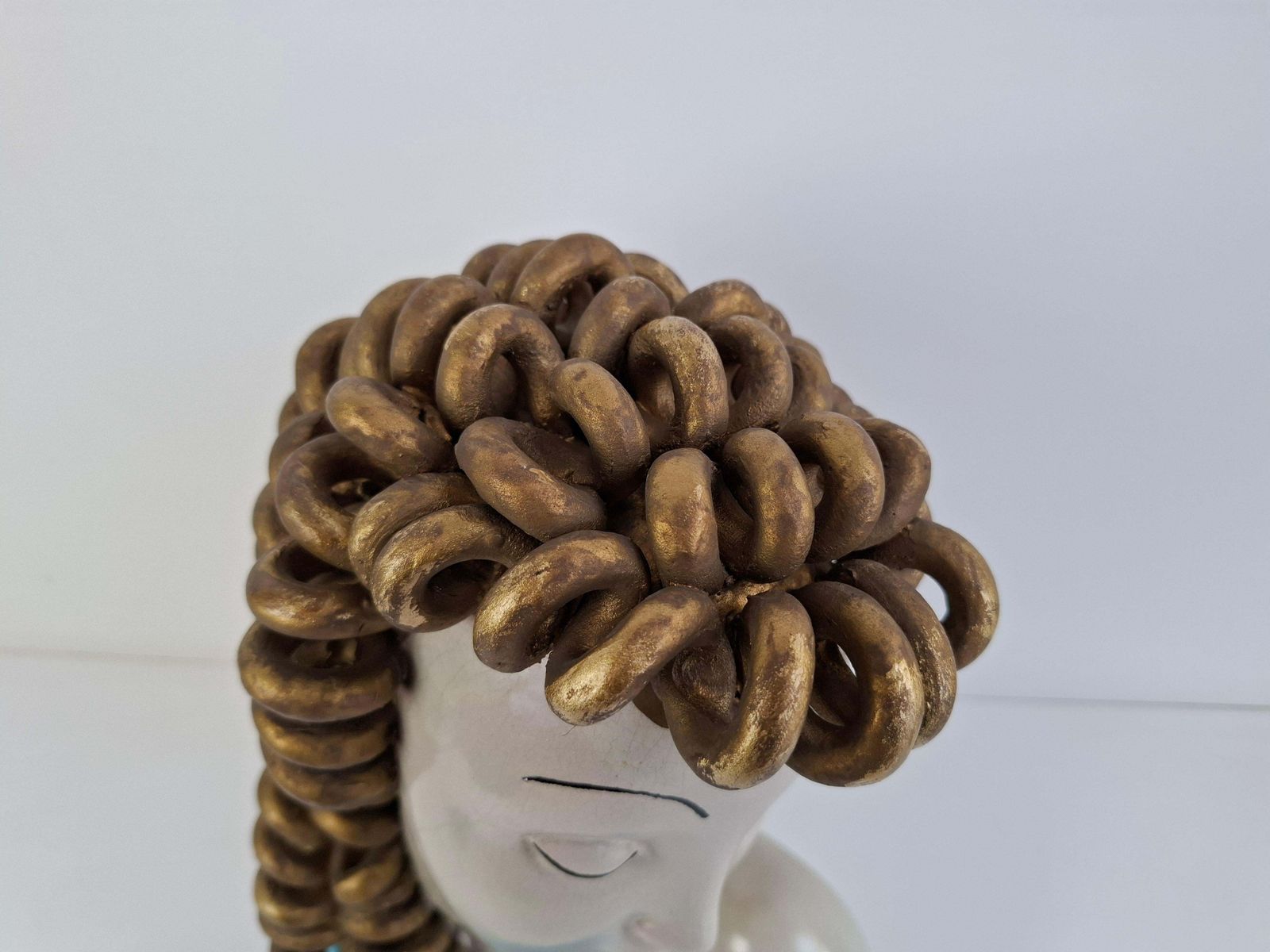photo furniture 1930s Czechoslovak Art Deco Ceramic Bust Of A Woman With Gilded Curled Hair