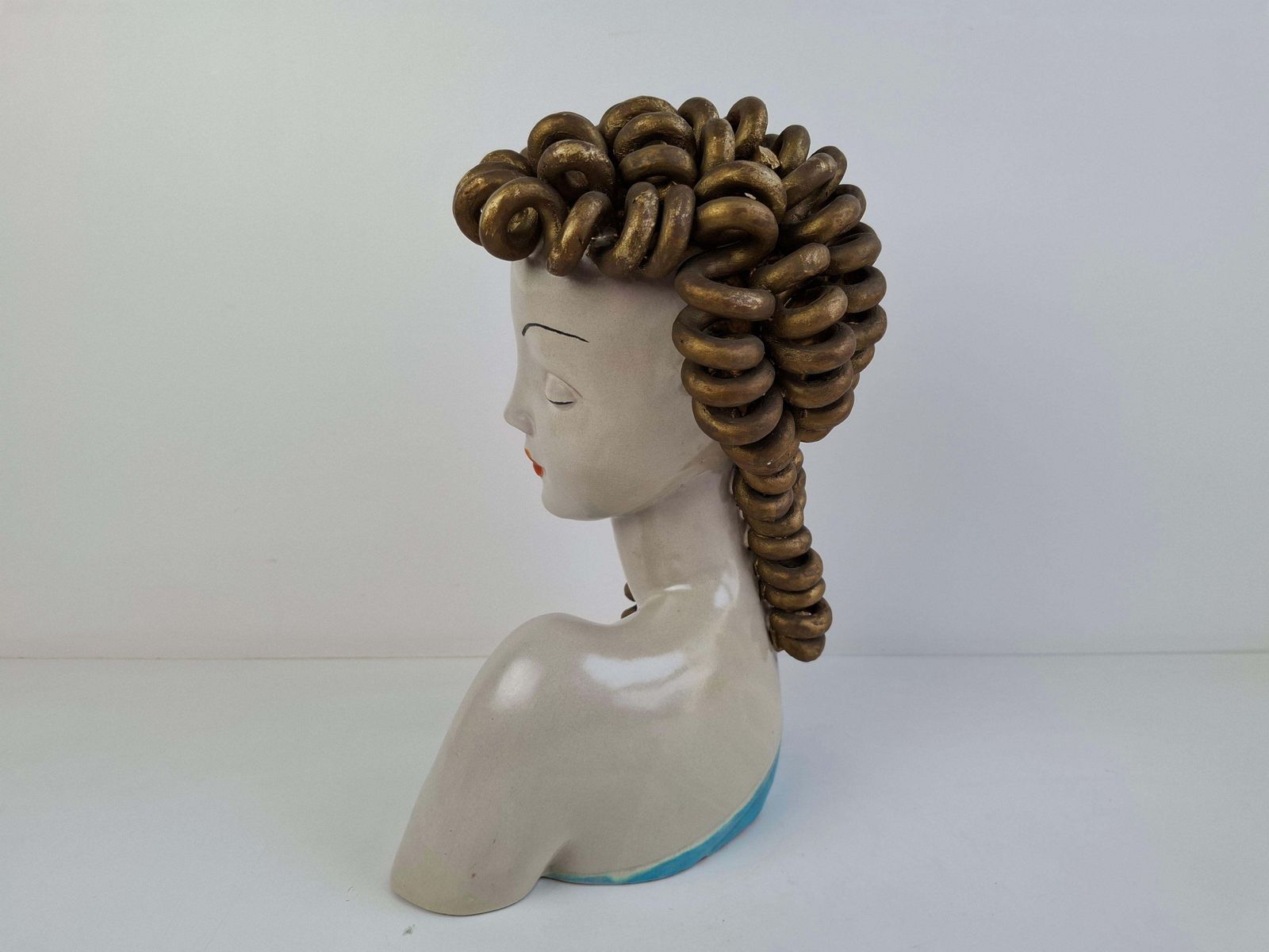 644.0 1930s Czechoslovak Art Deco Ceramic Bust Of A Woman With Gilded Curled Hair photo