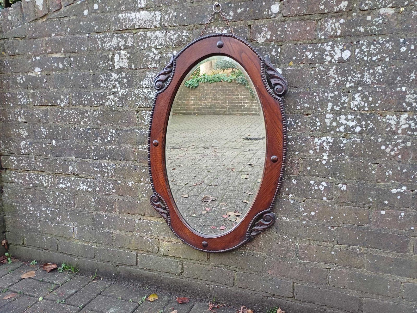 Antique 1920s Oak Oval Mirror Hand Carved Quarter Panels, Original Bevelled Glass & Chain Arts And Crafts Edwardian Wall Mirror