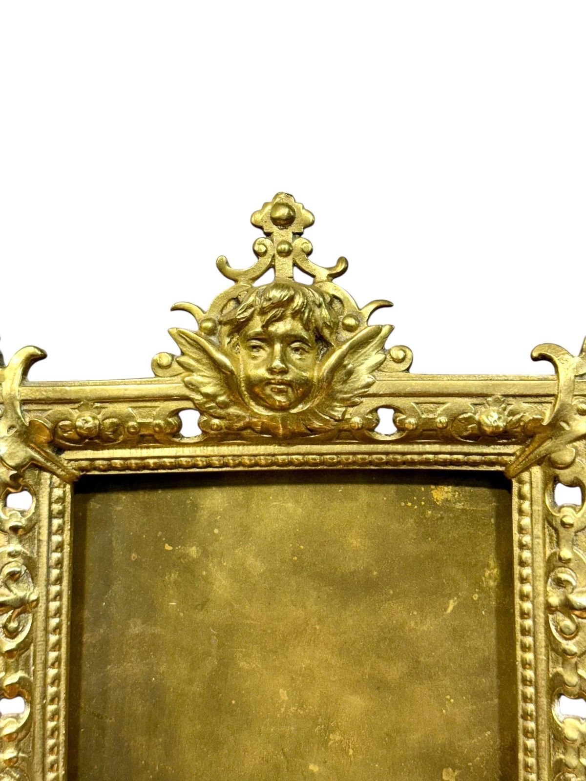 photo buy Ornate 19th Century Gilt Bronze Tabletop Frame With Cherub Motif