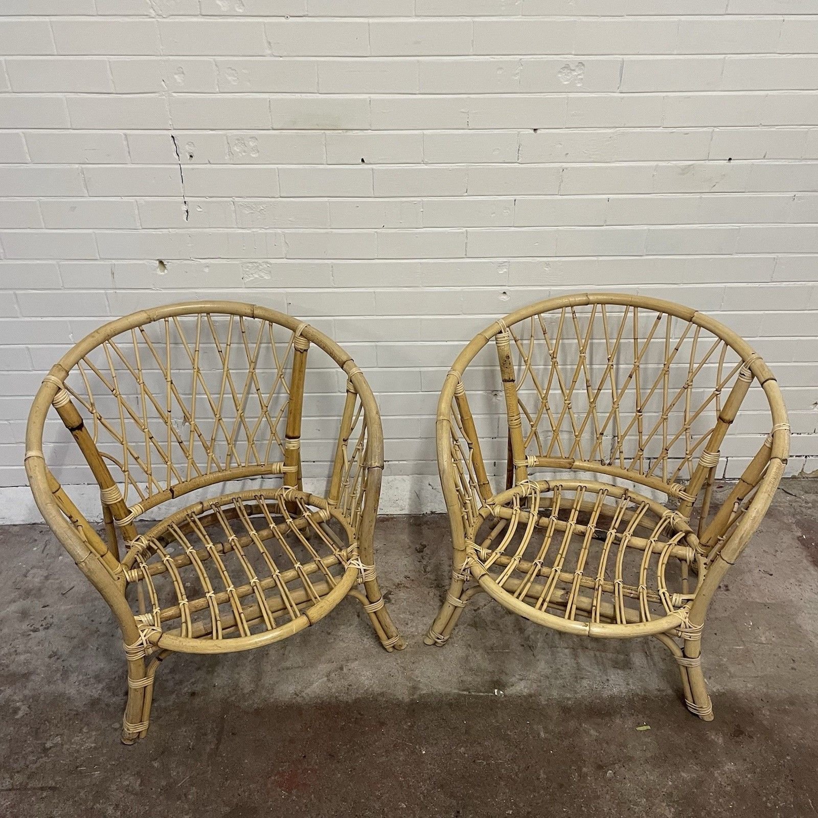 A Pair Of Attractive Rattan Wicker Low Curved Back Chairs. photo for sale