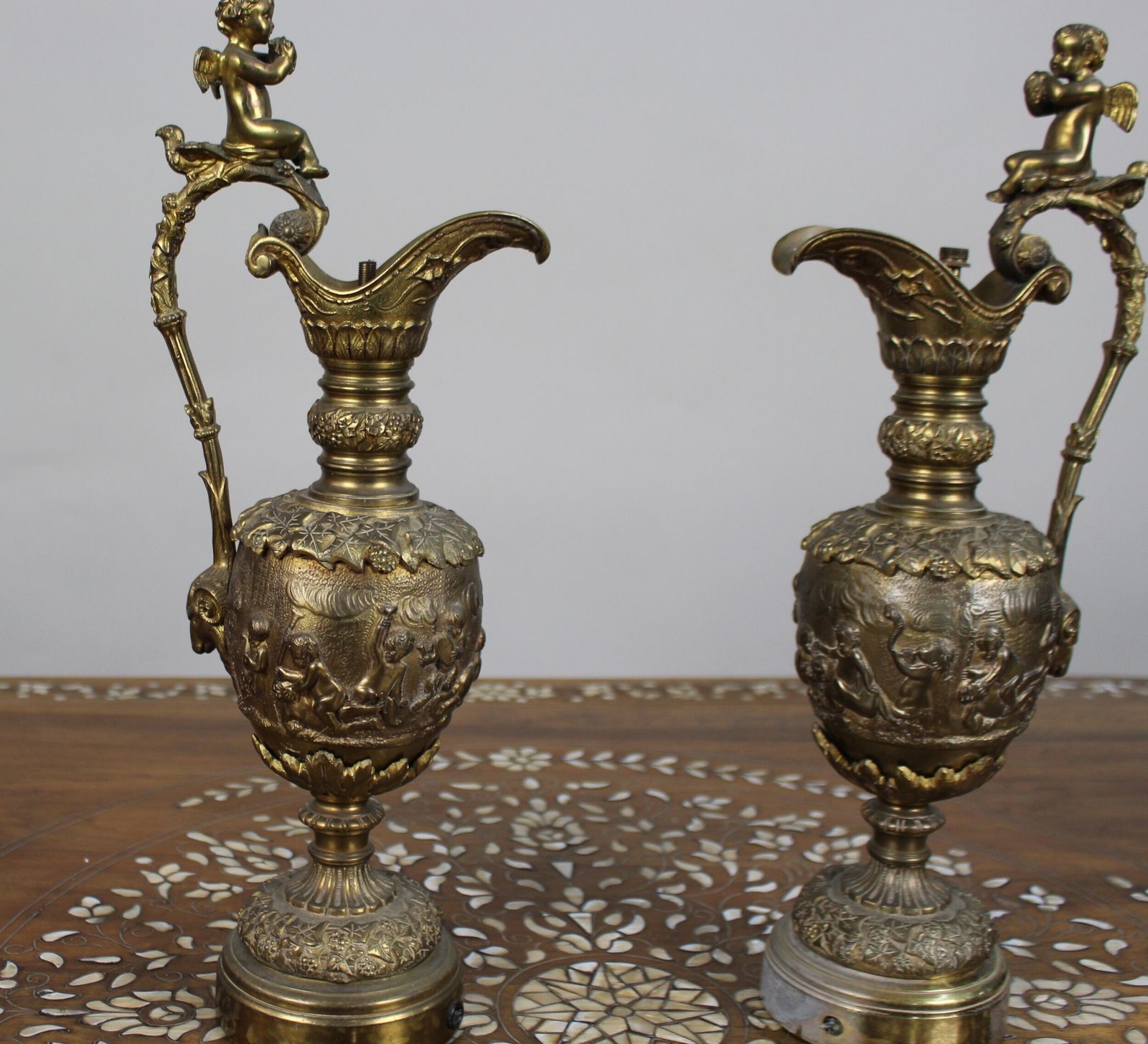 Pair Of 19th Century French Gilt Bronze Bacchanalian Ewers With Cherubs photo for sale