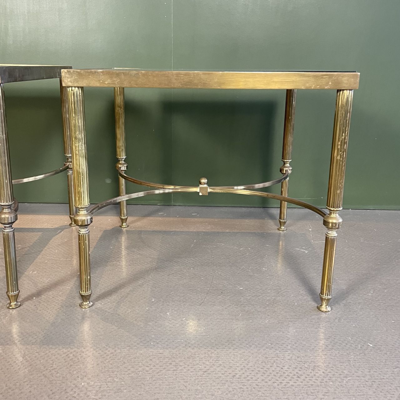 photo furniture Pair Of Midcentury Brass And Smoked Glass Coffee Tables