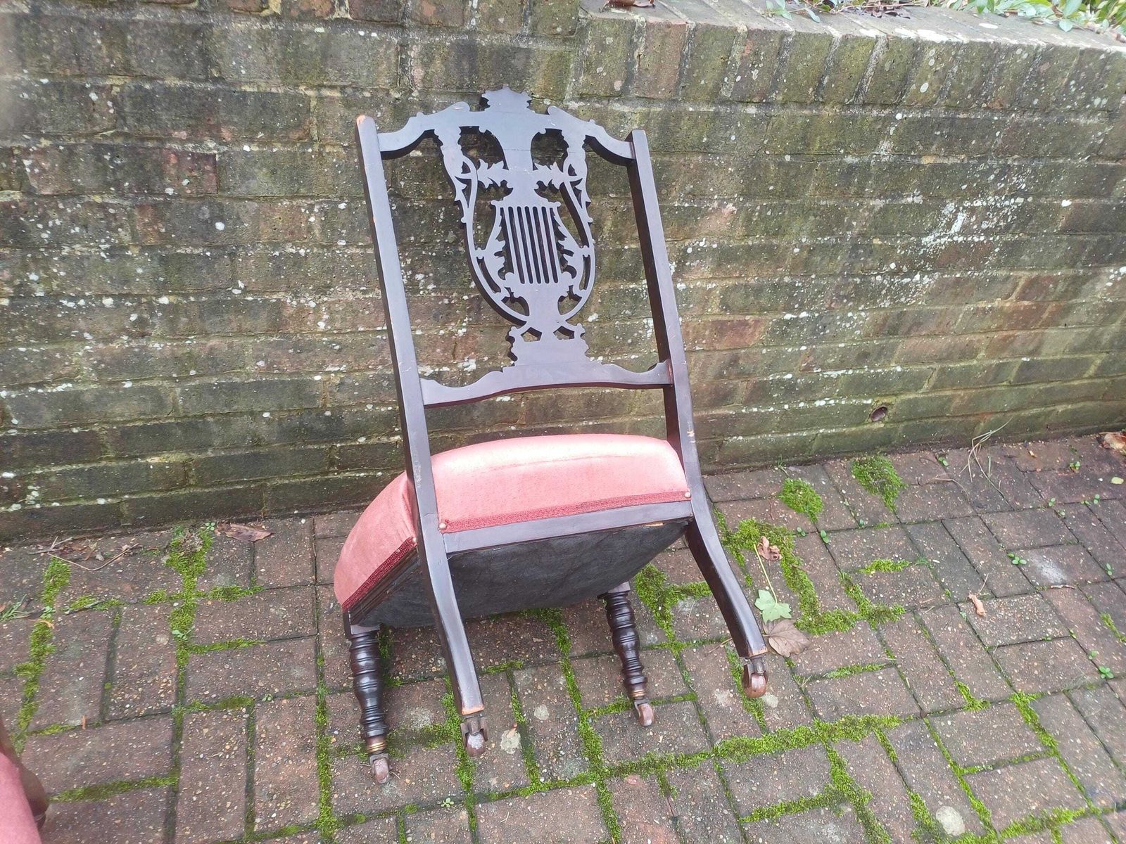 photo vintage Pair Victorian Mahogany Occasional Chairs Ebonised Finish Carved Fretwork Backs Turned Legs Porcelain Castors Pink Seats