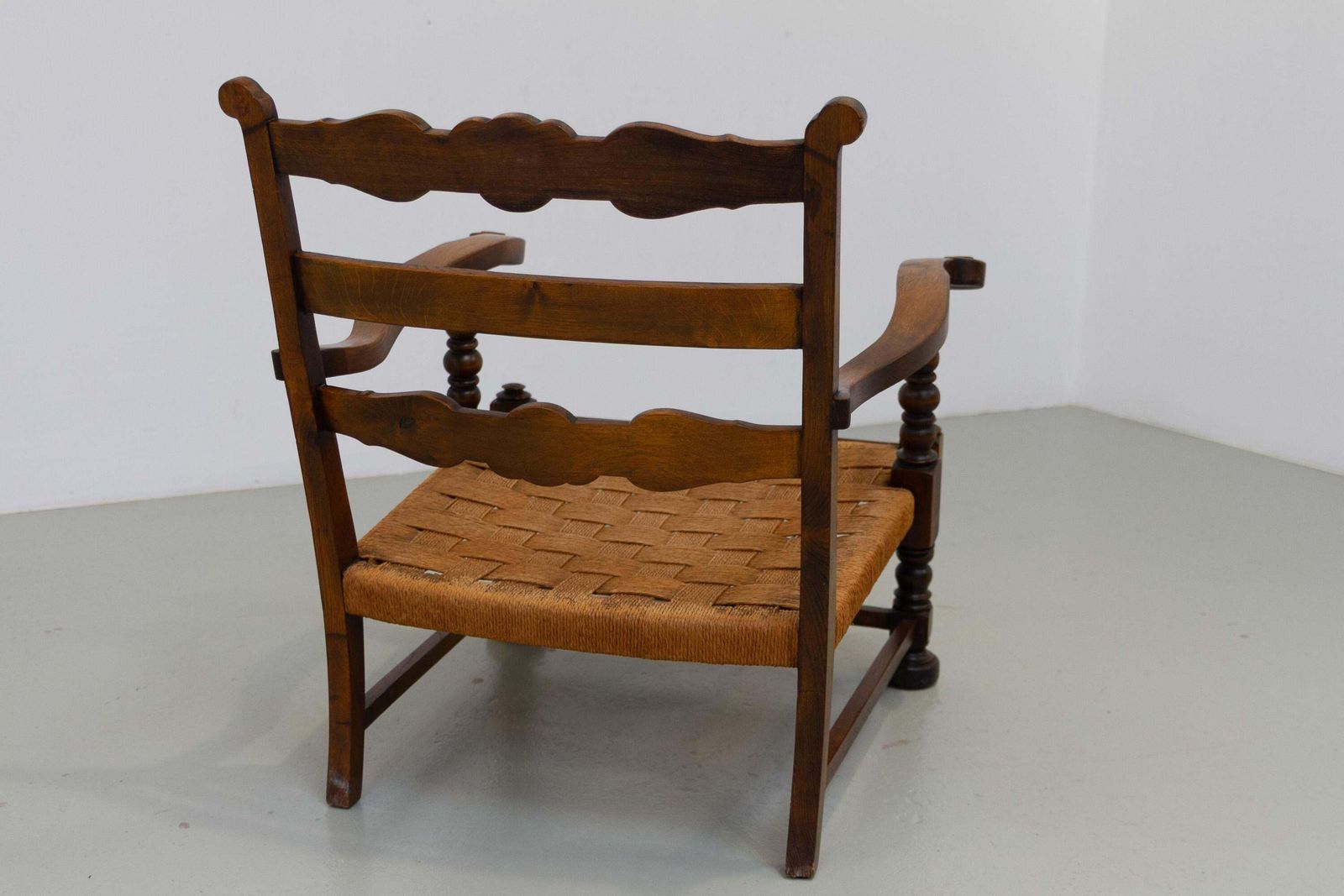 photo for sale Danish Art Nouveau Lounge Chair In Oak And Papercord, 1930s.