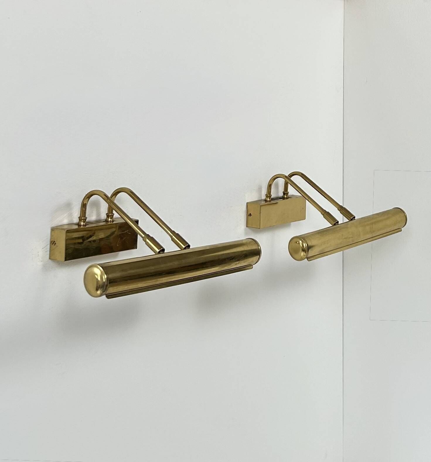 photo furniture Pair Of Vintage Adjustable Wall Lights In Patinated Brass, France, 1970.