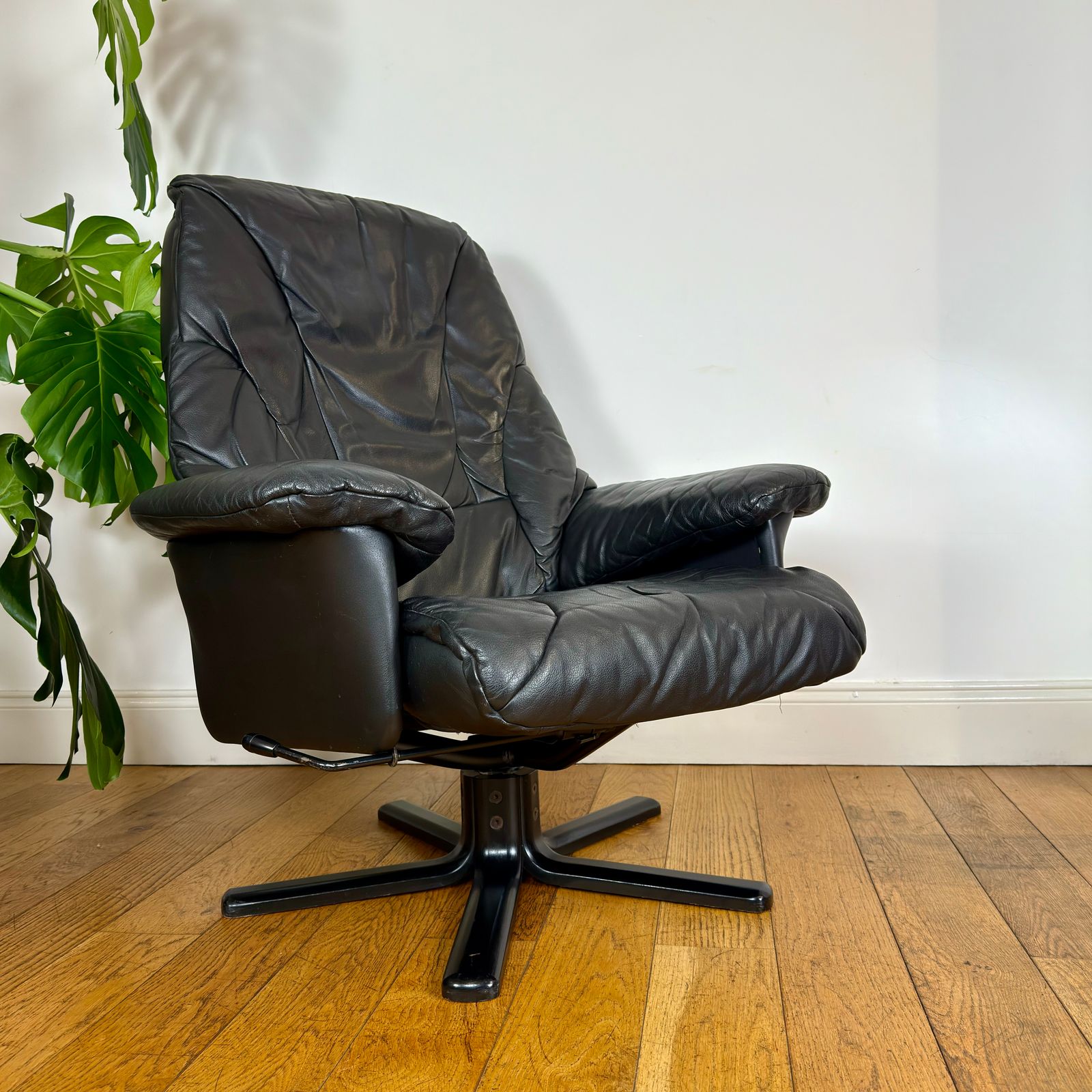 photo furniture Vintage Scandinavian Leather Recliner Swivel Chair And Footstool