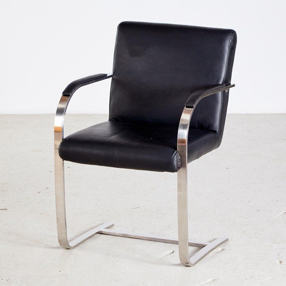 Steel Armchair With Leather Upholstery photo furniture