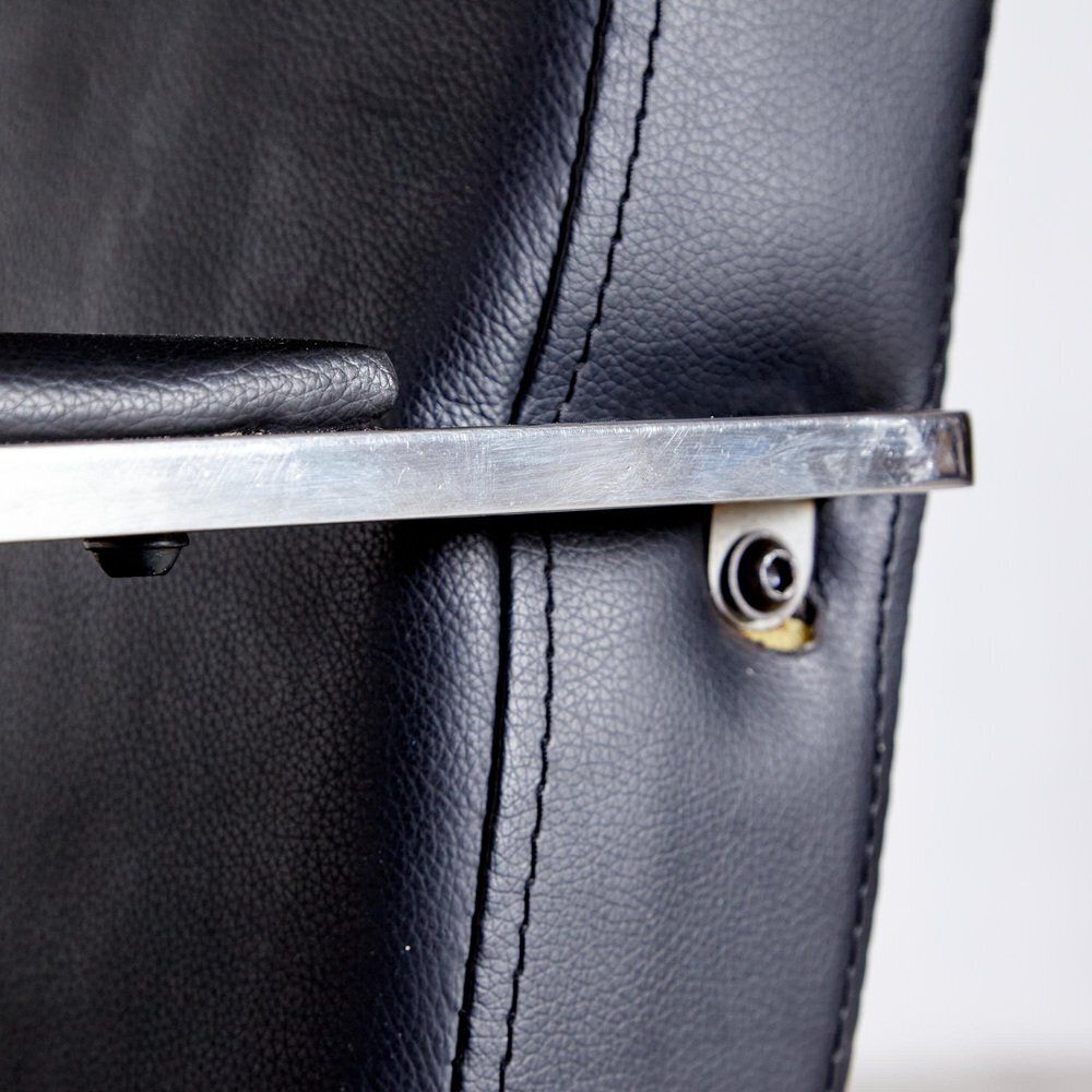 Steel Armchair With Leather Upholstery photo vinterior