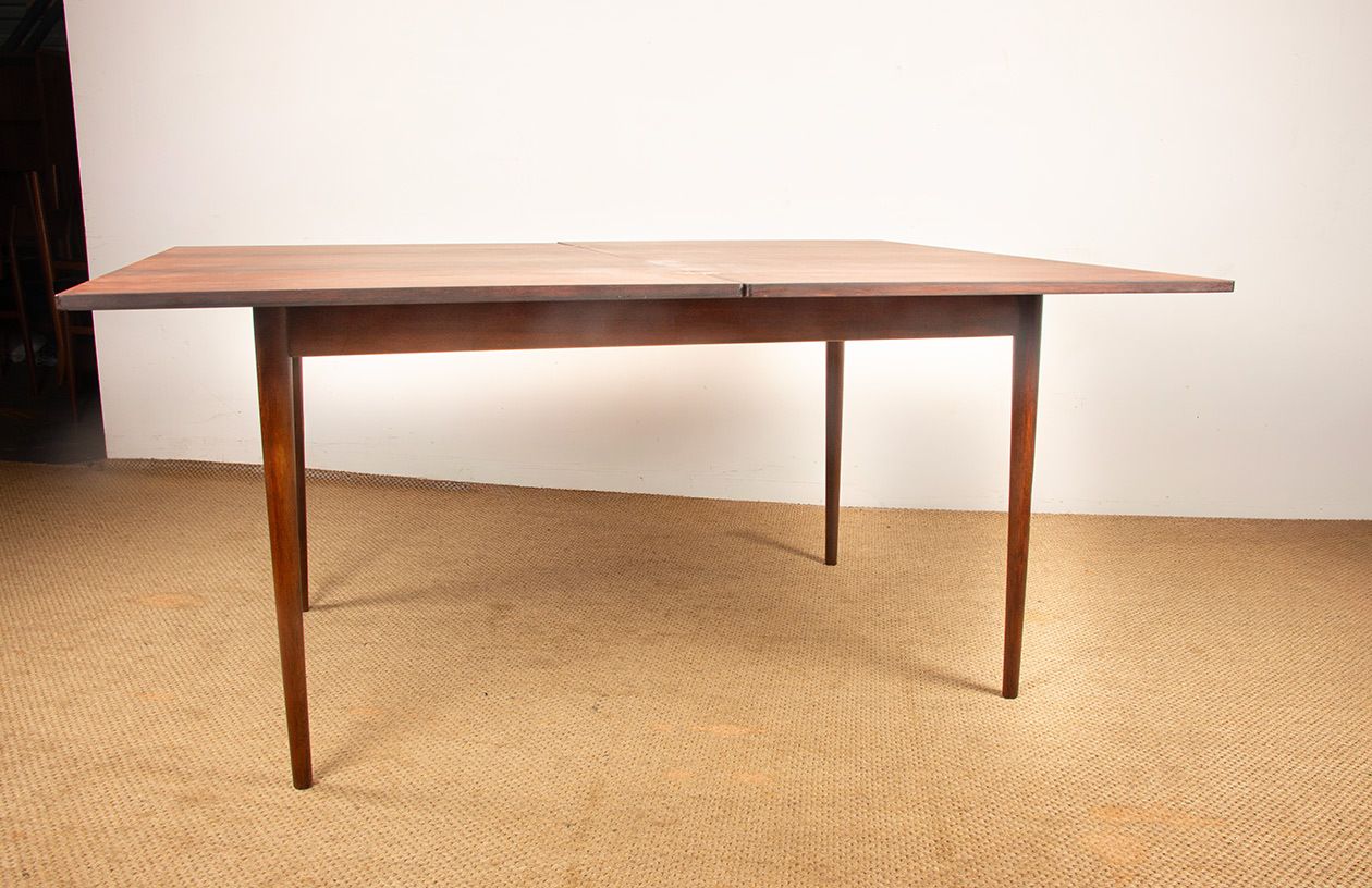 photo buy Table à manger danoise extensible en palissandre et laiton par Poul Volther pour Frem Møbelfabrik, 1960.