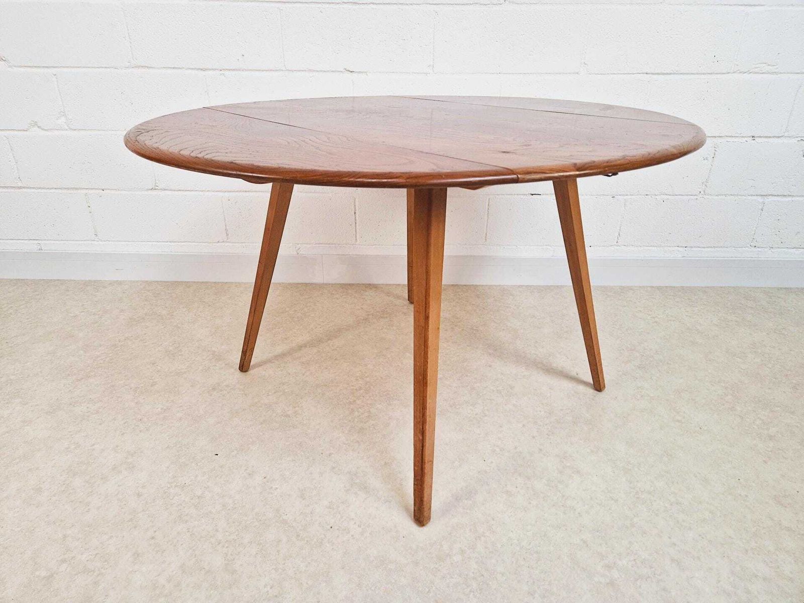 photo furniture Ercol Vintage Mid Century Solid Elm Drop Leaf Table And Stickback Chair Dining Set Pg023