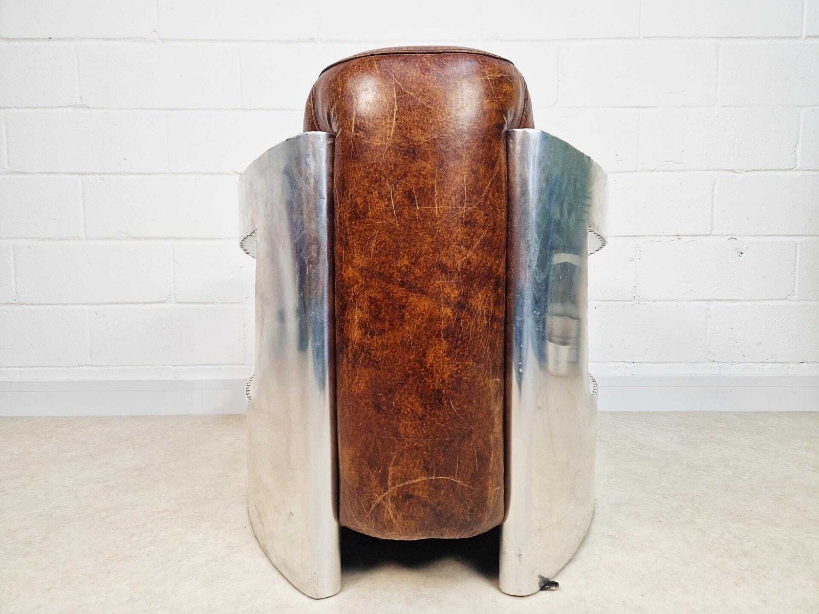 photo furniture Vintage Mid Century Aluminium & Chesnut Leather Aviator Lounge Accent Armchair Pg050