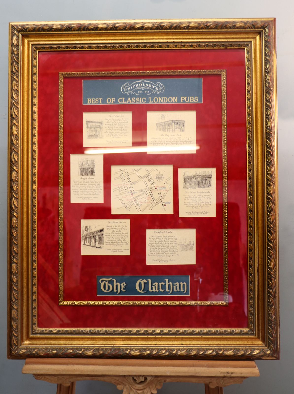 A Framed Montage Of Pictures And Text Relating To The Nicholson's Pubs Of Central London. photo furniture