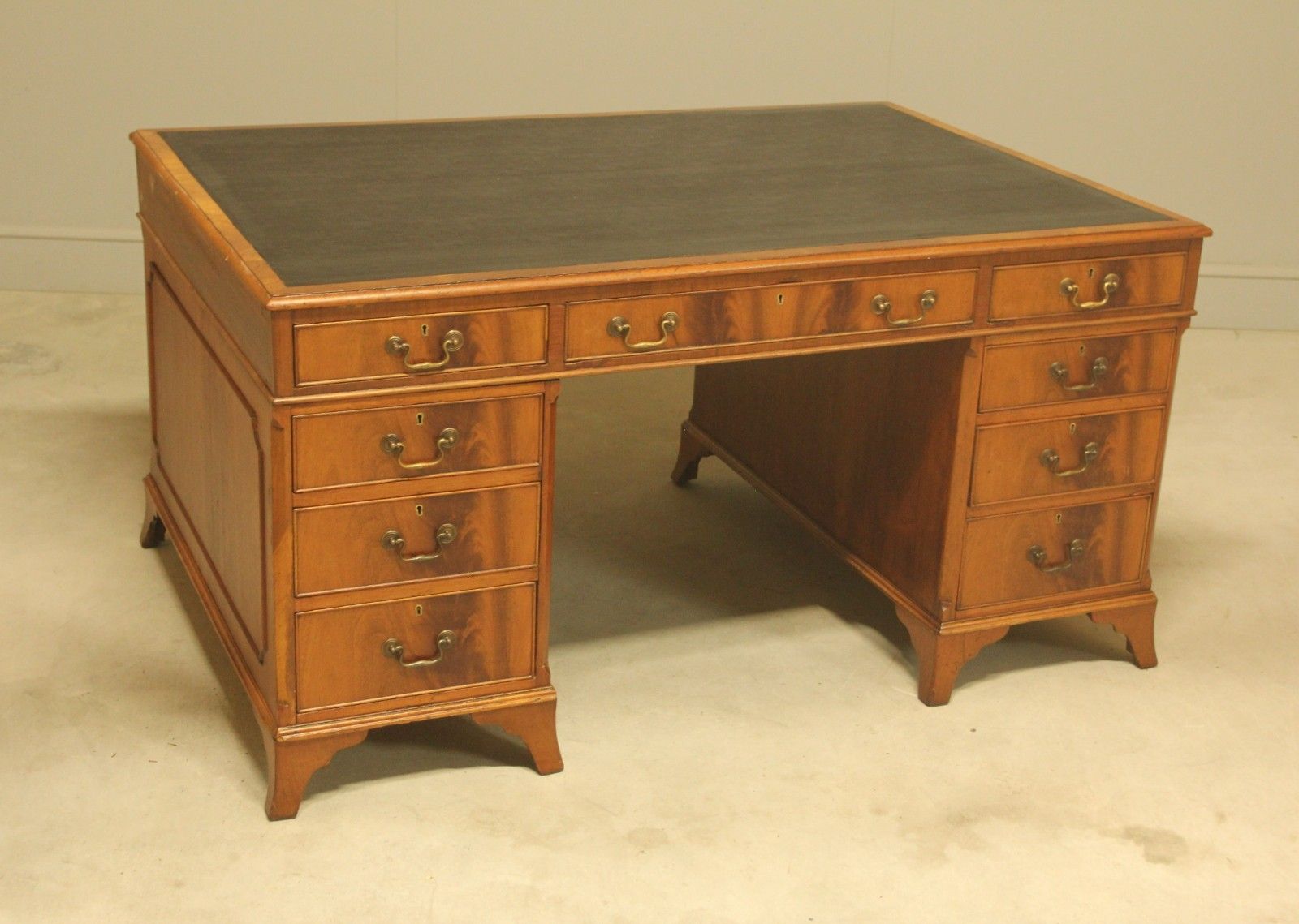 An Early 20th Century Curl Mahogany Partners Desk