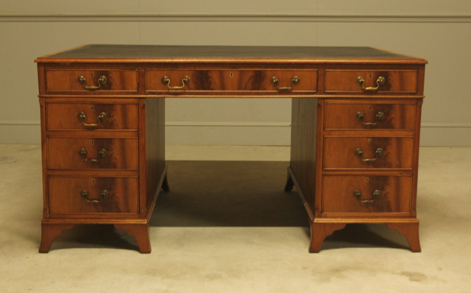 An Early 20th Century Curl Mahogany Partners Desk photo furniture