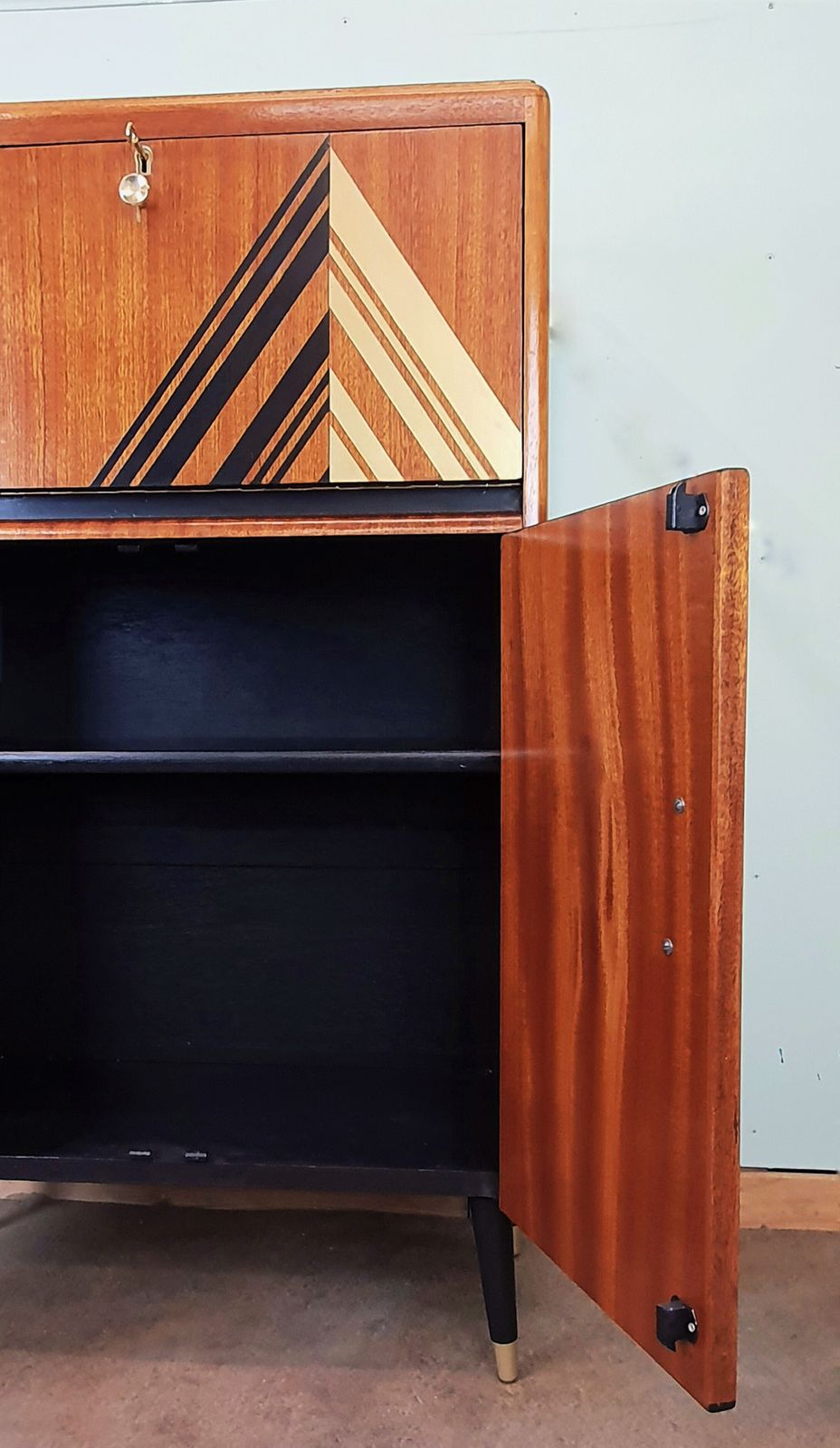 Mid Century Modern Drinks Cabinet With Black & Gold Geometric Design photo vintage