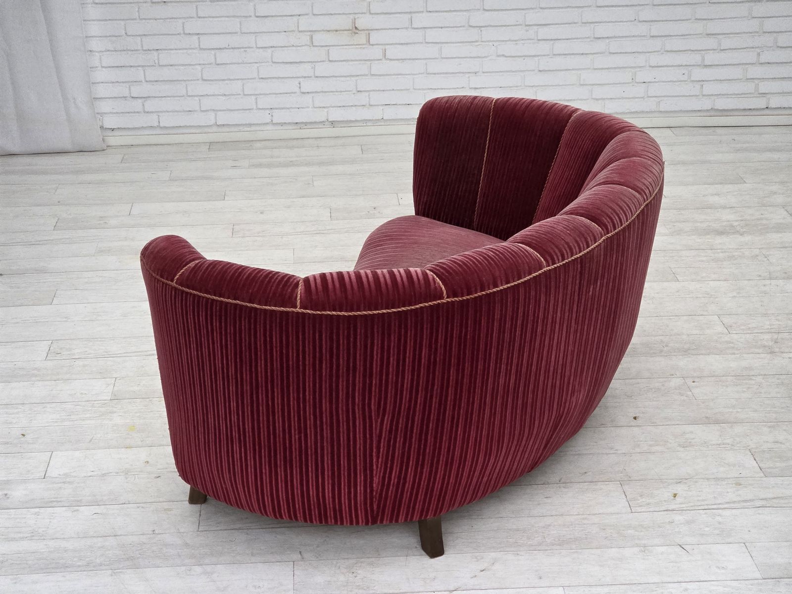 photo vinterior 1960s, Danish 2 Seater "Banana" Sofa, Red Furniture Velour, Oak Wood.
