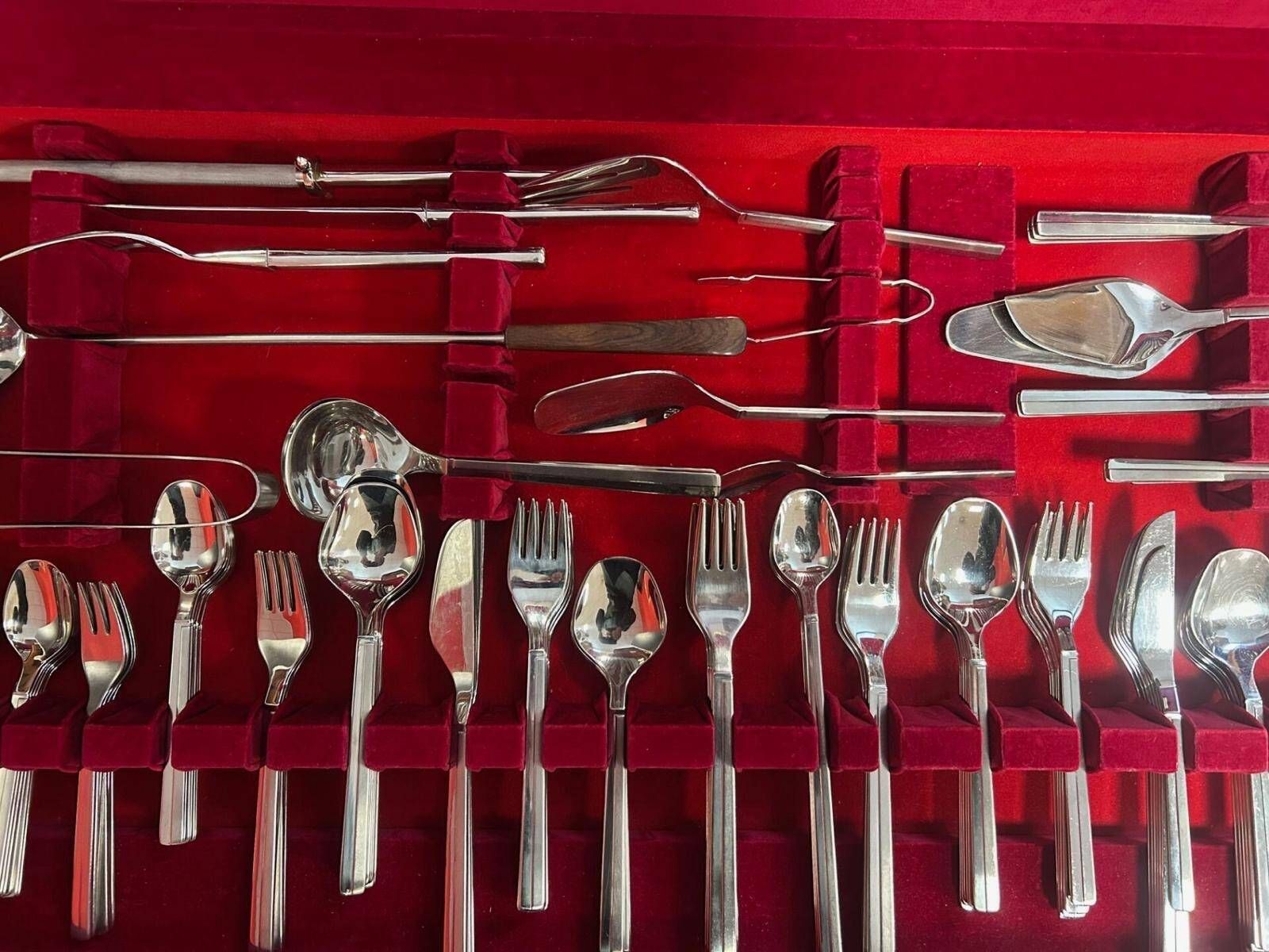 Modernist Cutlery Set In Its Wooden Cabinet, 130 Stainless Steel Pieces From The 1960s. photo for sale