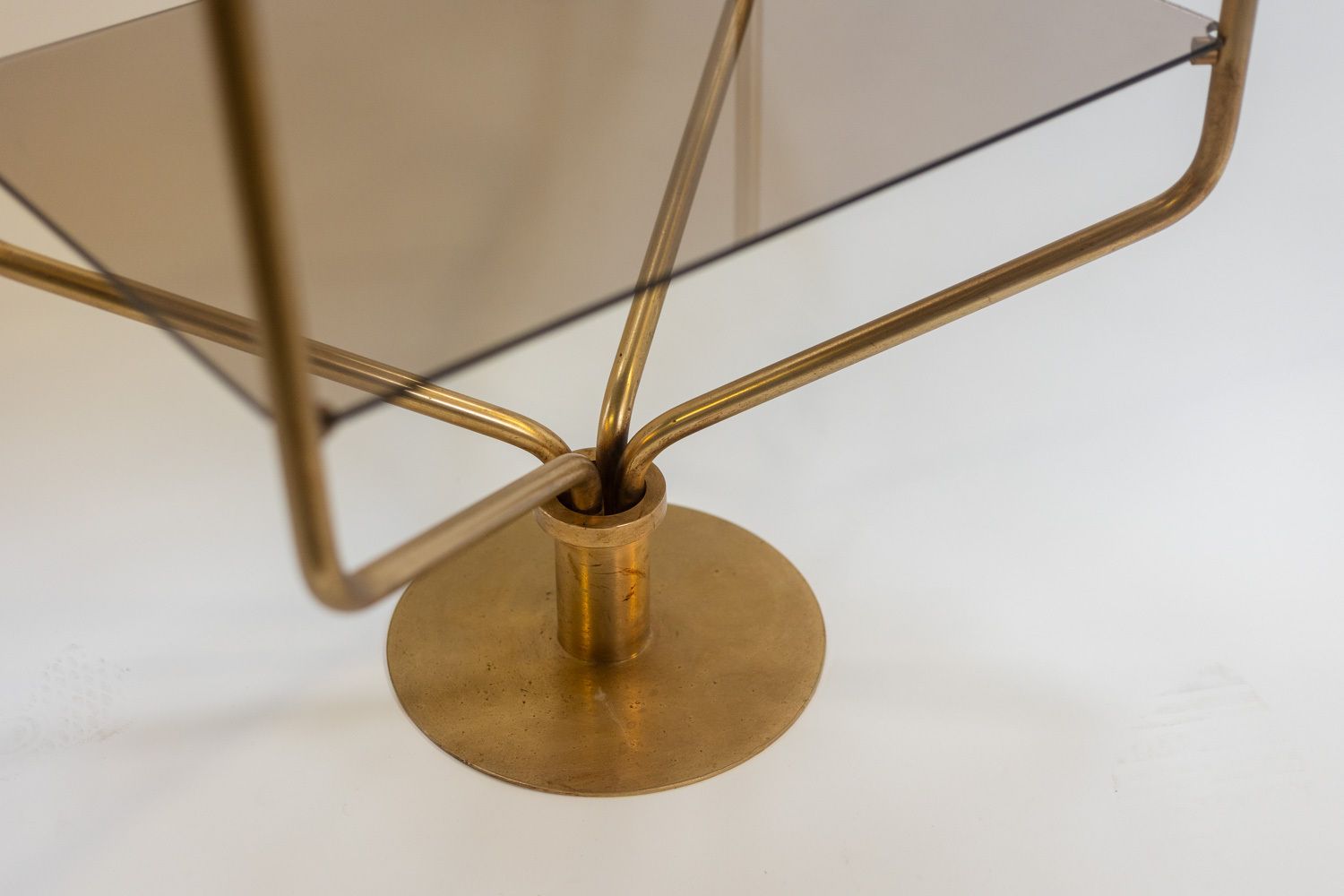 Shelf In Gold Plated Brass With Smoked Glass Shelves. 1970s. photo vinterior