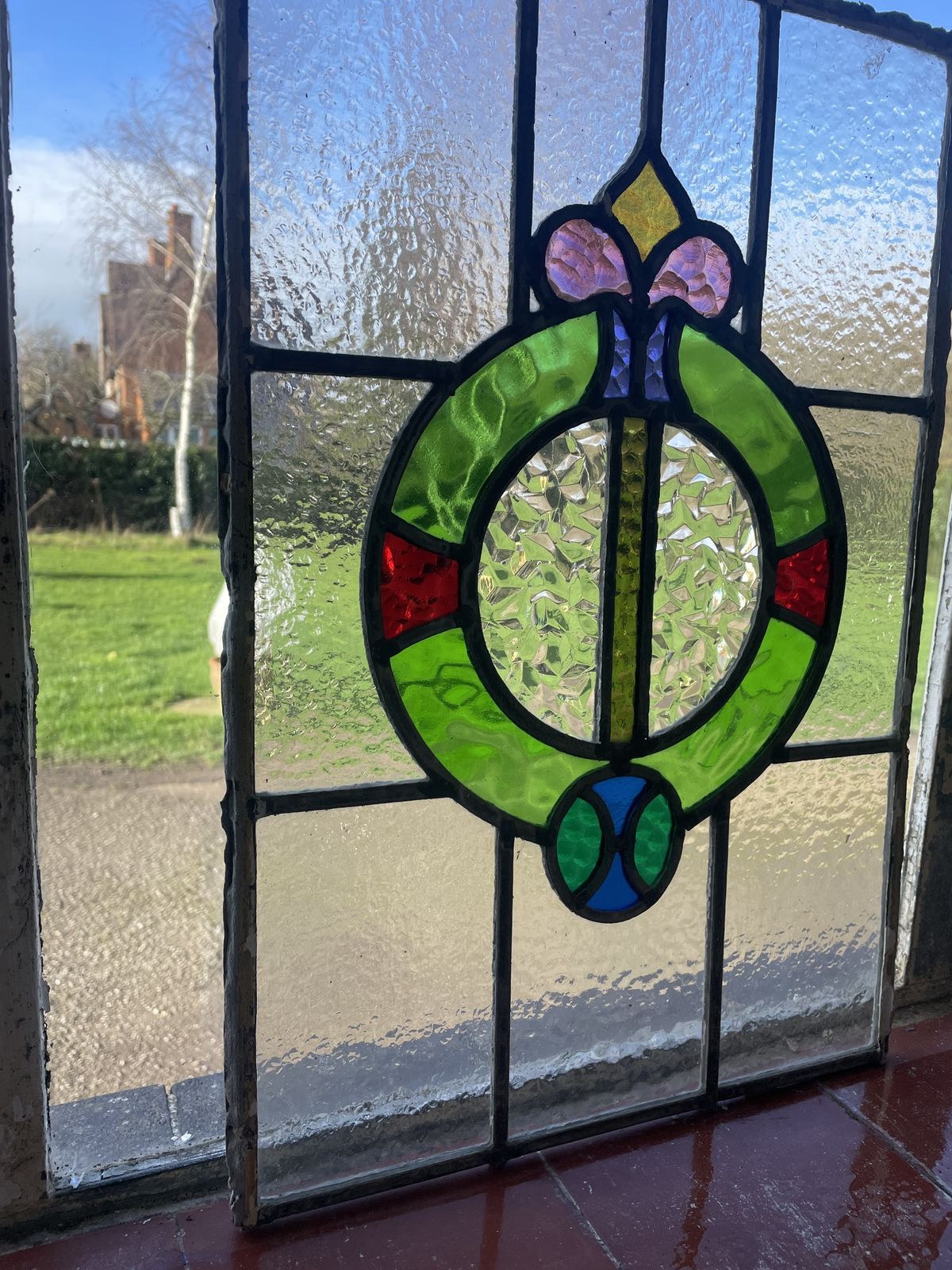 Edwardian Stained Glass Panel With Circular Wreath Motif And Stylised Floral Detail And Textured Glass C.1905 photo for sale