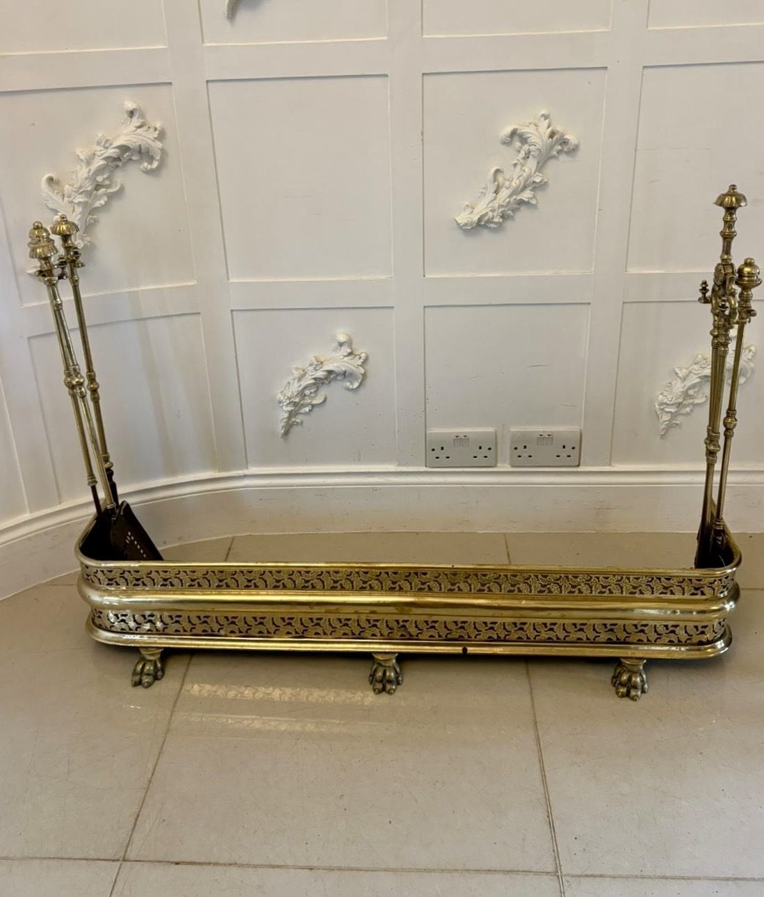photo for sale Unusual And Rare Quality Antique Regency Brass Fender With Original Fire Irons
