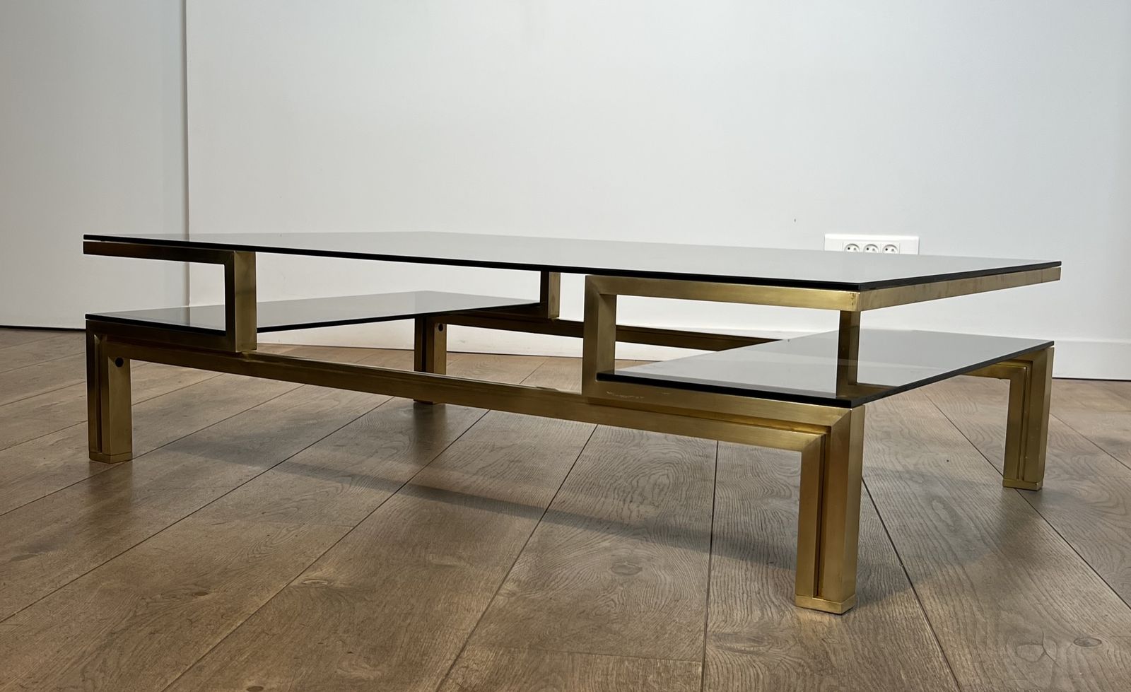 photo vintage Modernist Coffee Table In Brass And Smoked Glass Tops By Guy Lefèvre For Maison Jansen