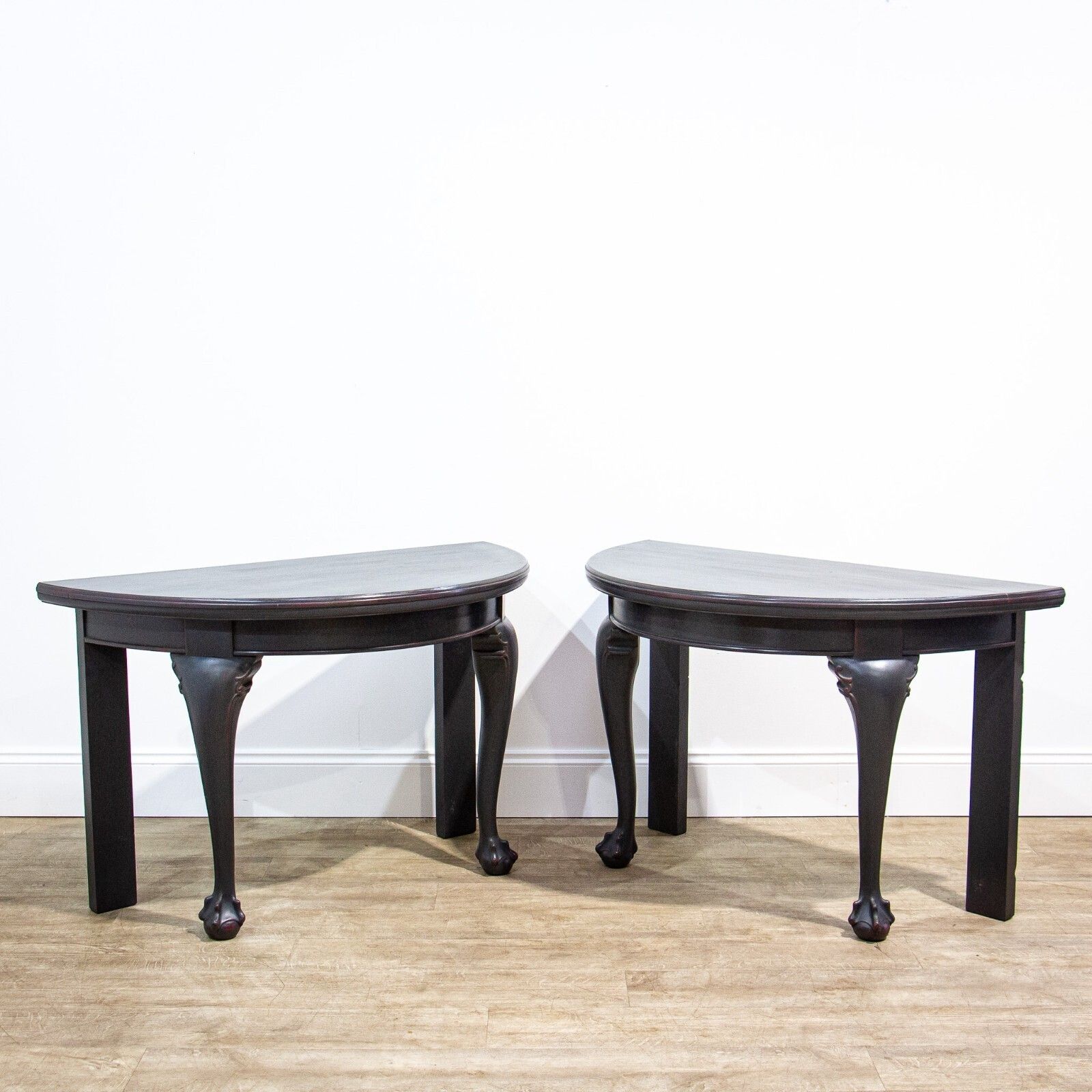 Pair Of Ball & Claw Foot Ebonised Demi Lune Tables