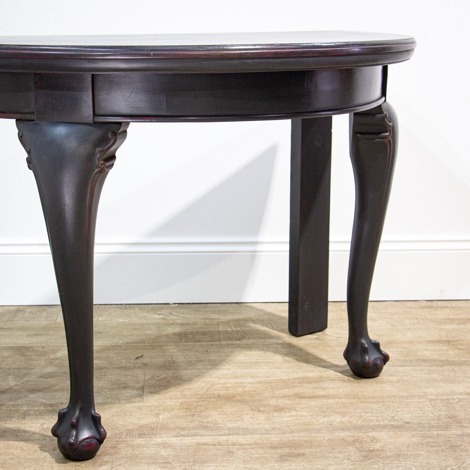 photo furniture Pair Of Ball & Claw Foot Ebonised Demi Lune Tables