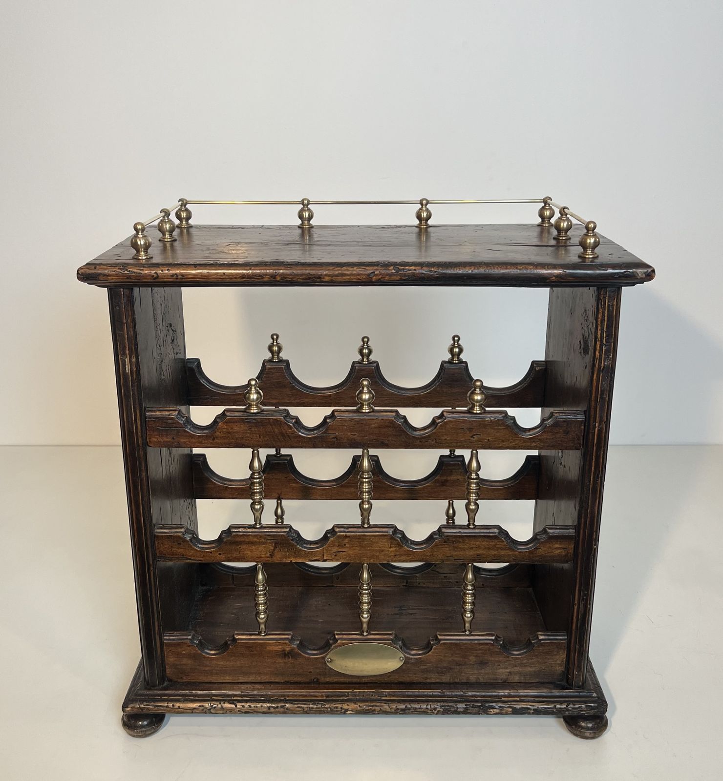 980.0 Wooden And Brass Bottle Holder photo