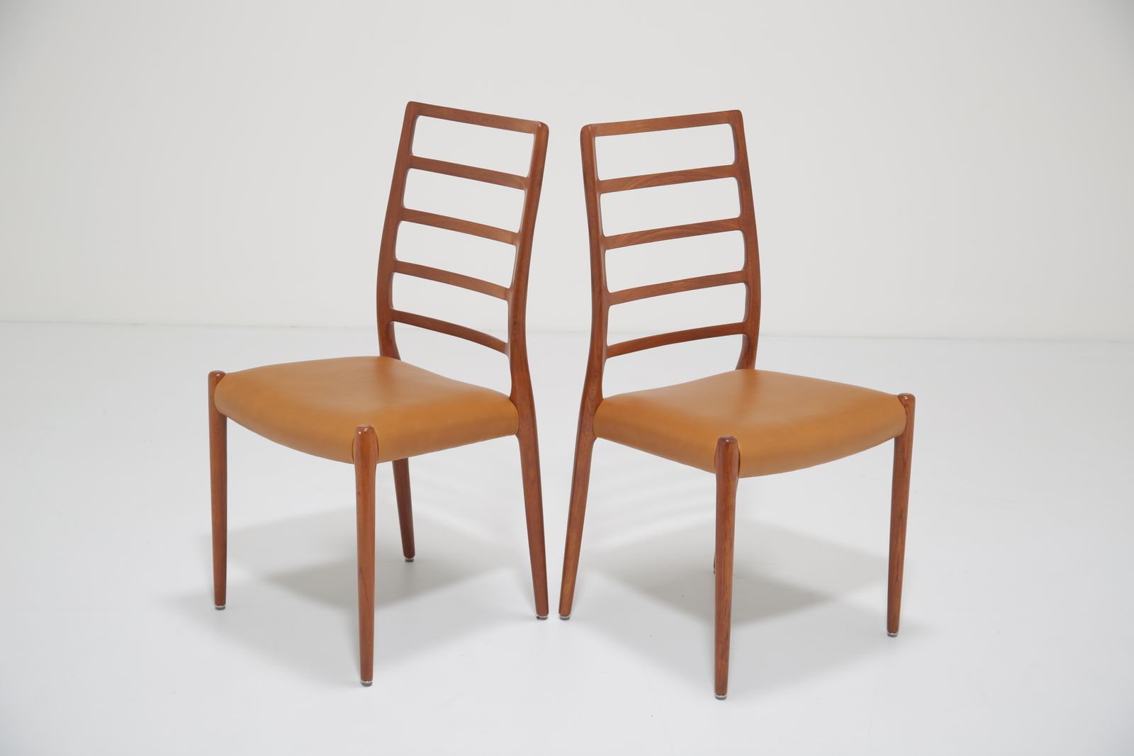 Niels Otto Møller Model 82 Dining Chairs: Set Of 8 In Solid Teak And Tan Leather For J.L. Møllers, 1960s photo vintage