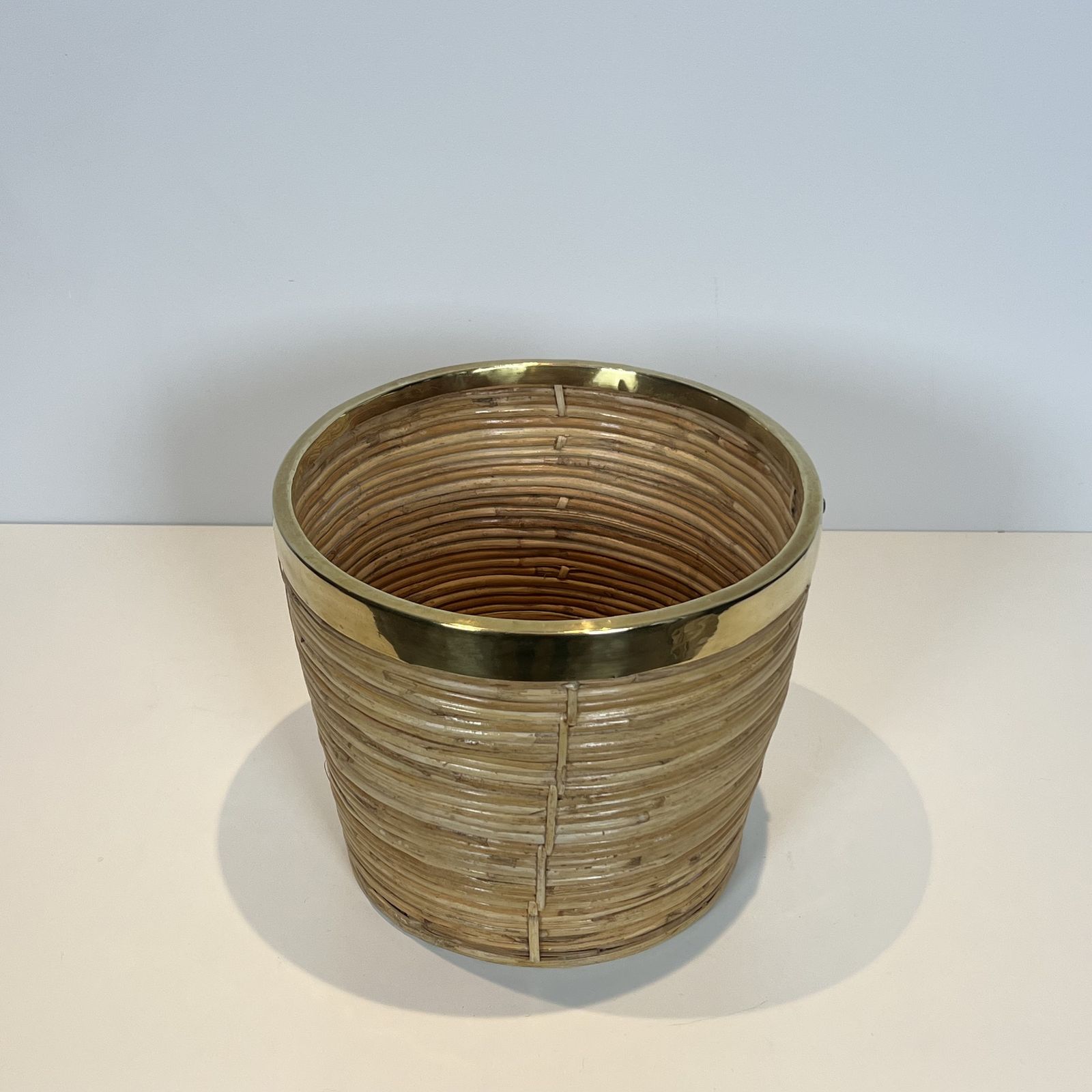 Rattan And Brass Wastepaper Basket In The Style Of Gabriela Crespi photo for sale