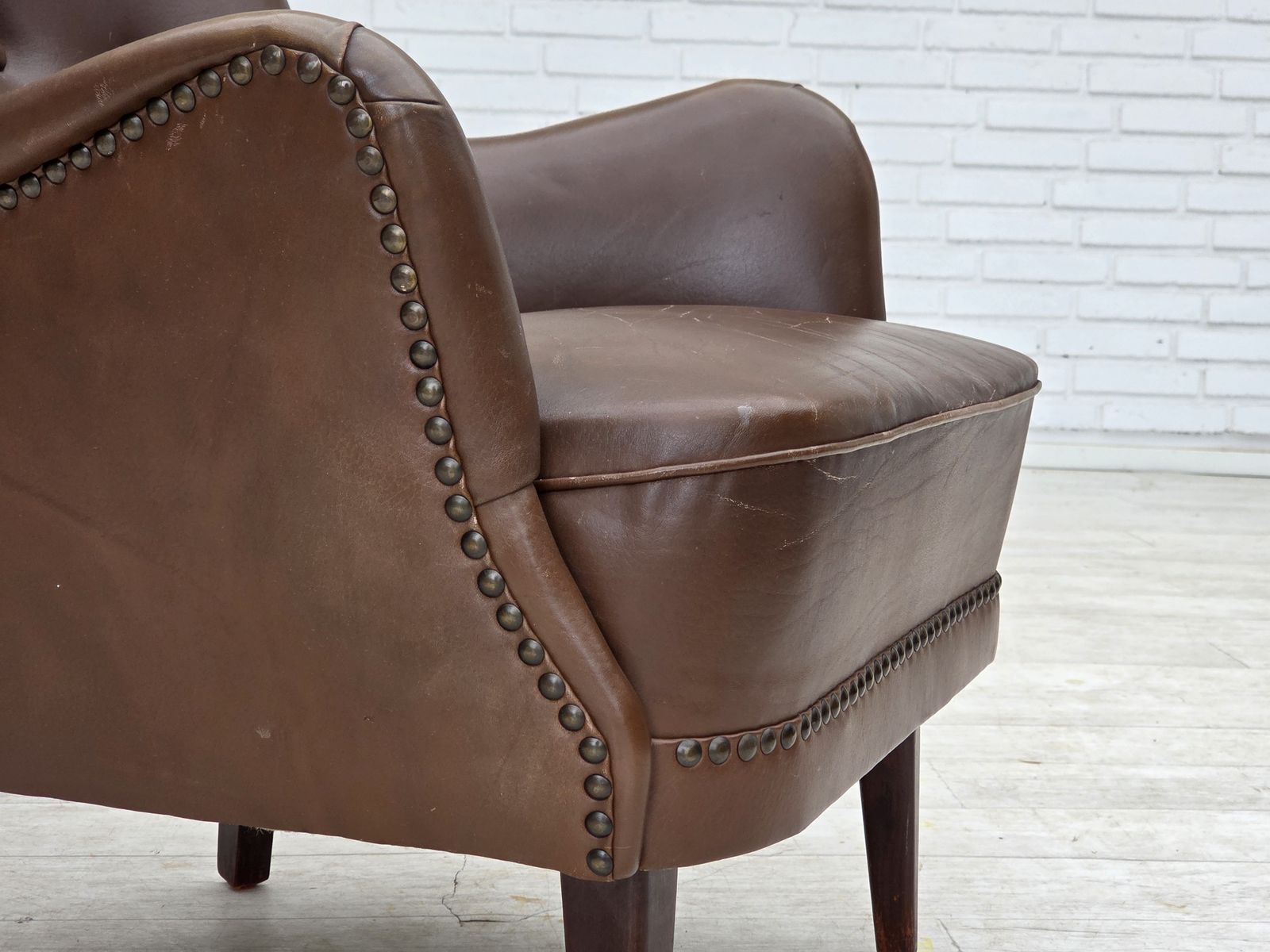 1960s, Danish Armchair, Furniture Leather, Ash Wood Legs. photo for sale