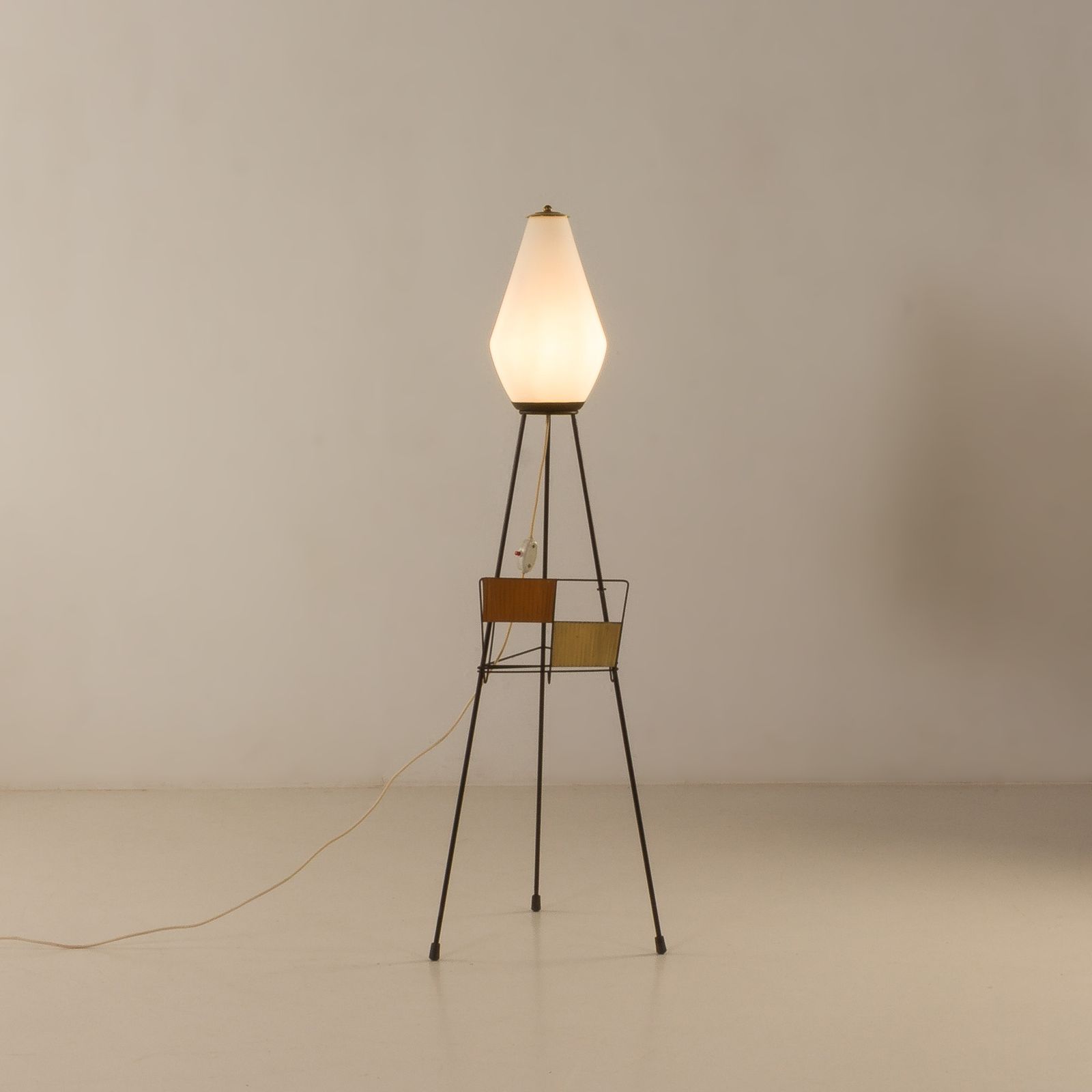 Italian Mid Century Floor Lamp With A Newspaper Rack In Stilnovo Style, 1960s photo for sale