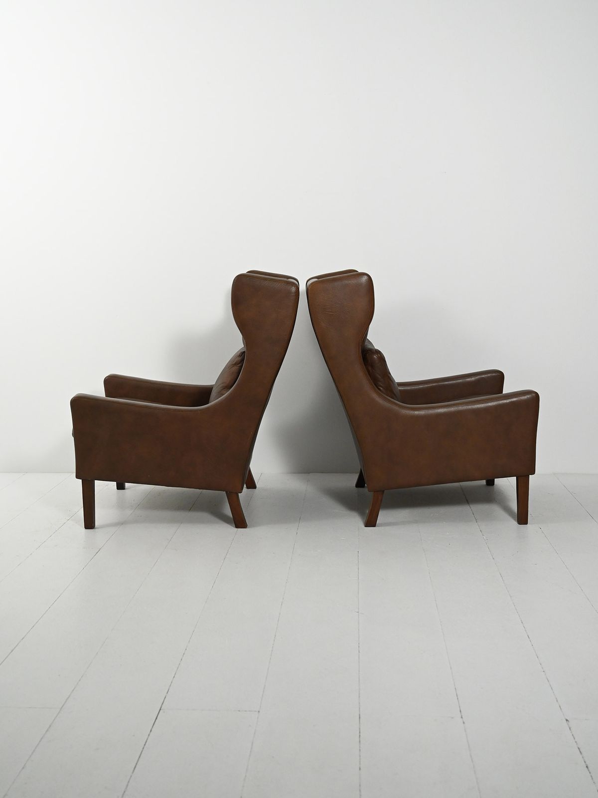 Pair Of Danish Armchairs In Dark Brown Leather