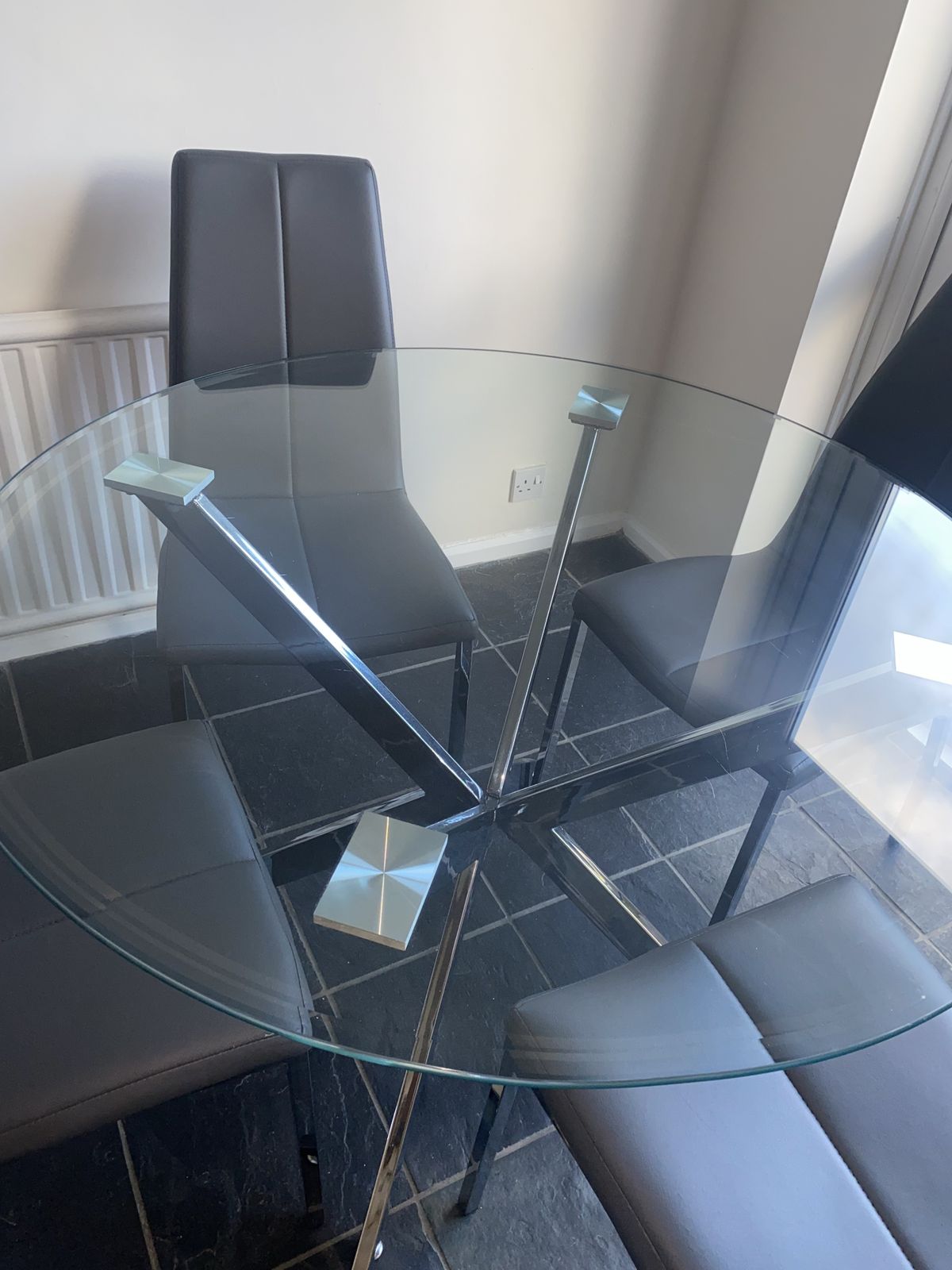 Round Glass And Chrome Table And 4 Grey Faux Leather And Chrome Chairs photo furniture