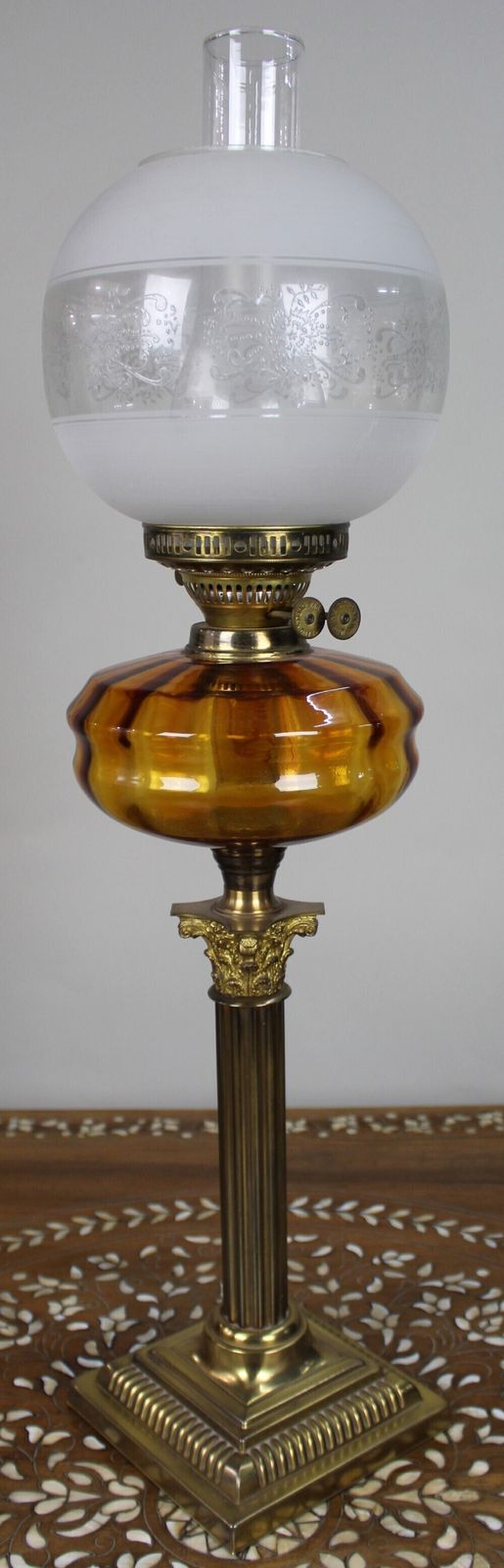 Victorian Brass Oil Lamp With Amber Glass Font photo for sale