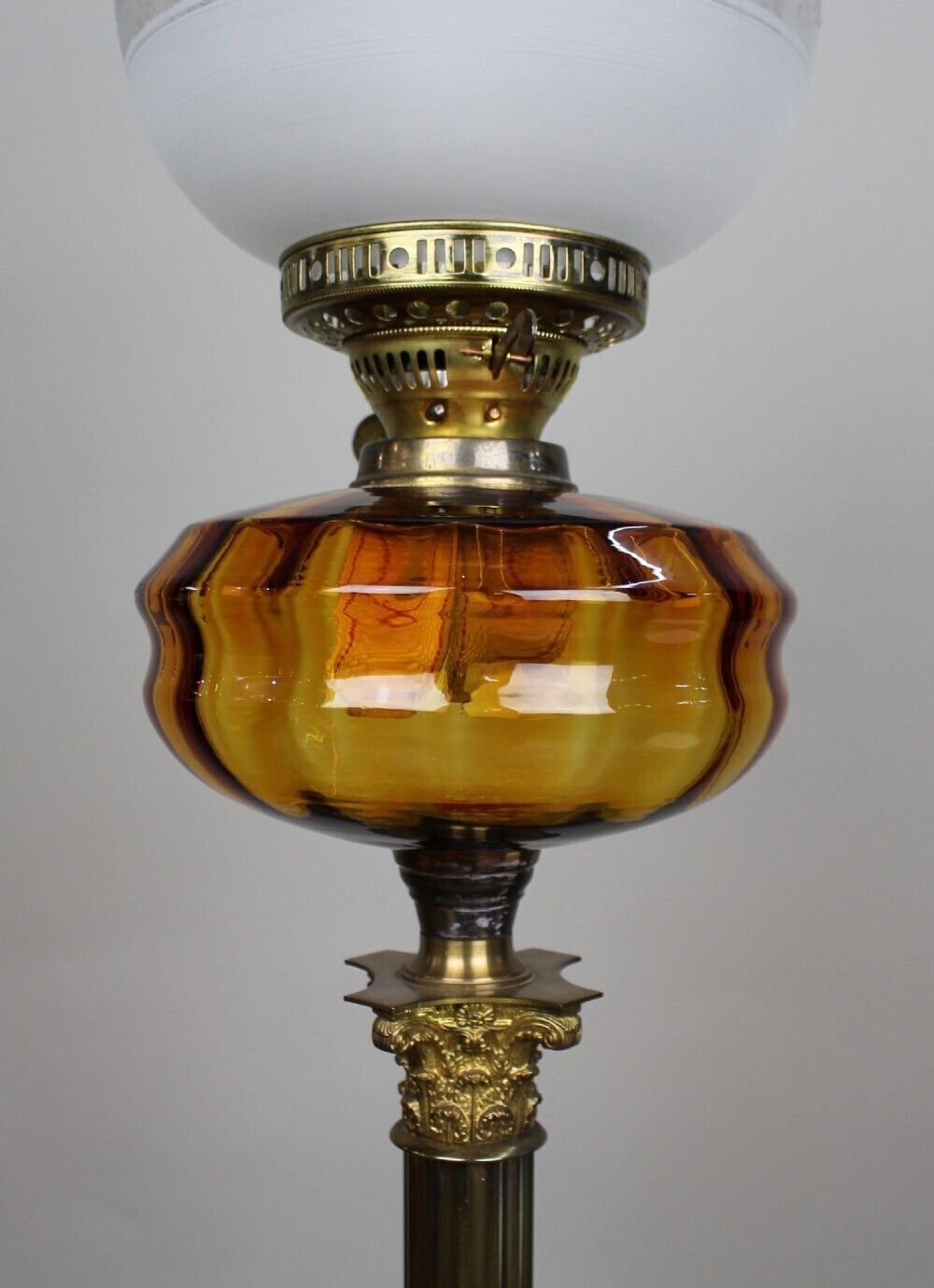 Victorian Brass Oil Lamp With Amber Glass Font photo vintage