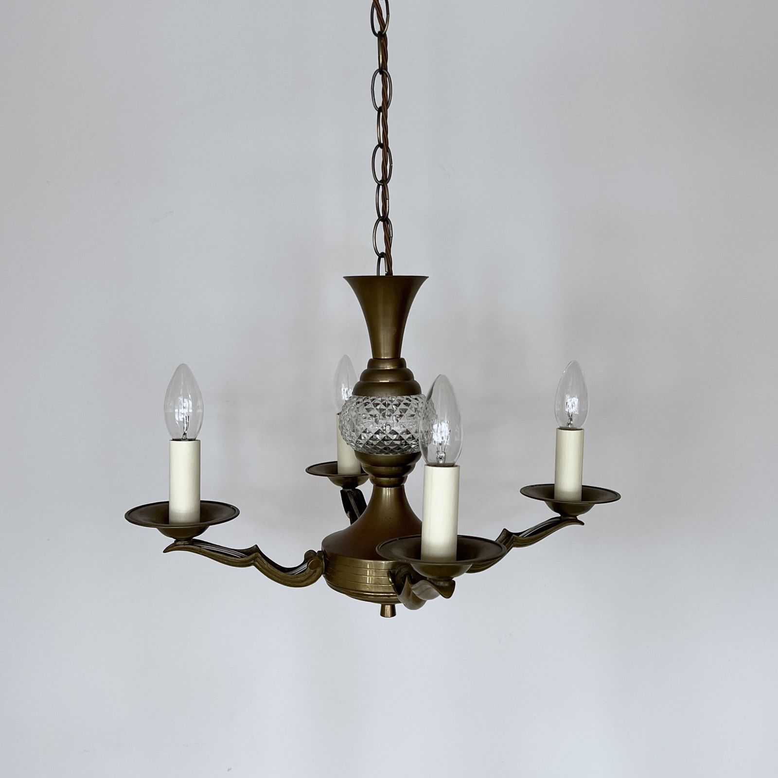 Brass Four Arm Chandelier With Faceted Glass Stem Detail photo for sale