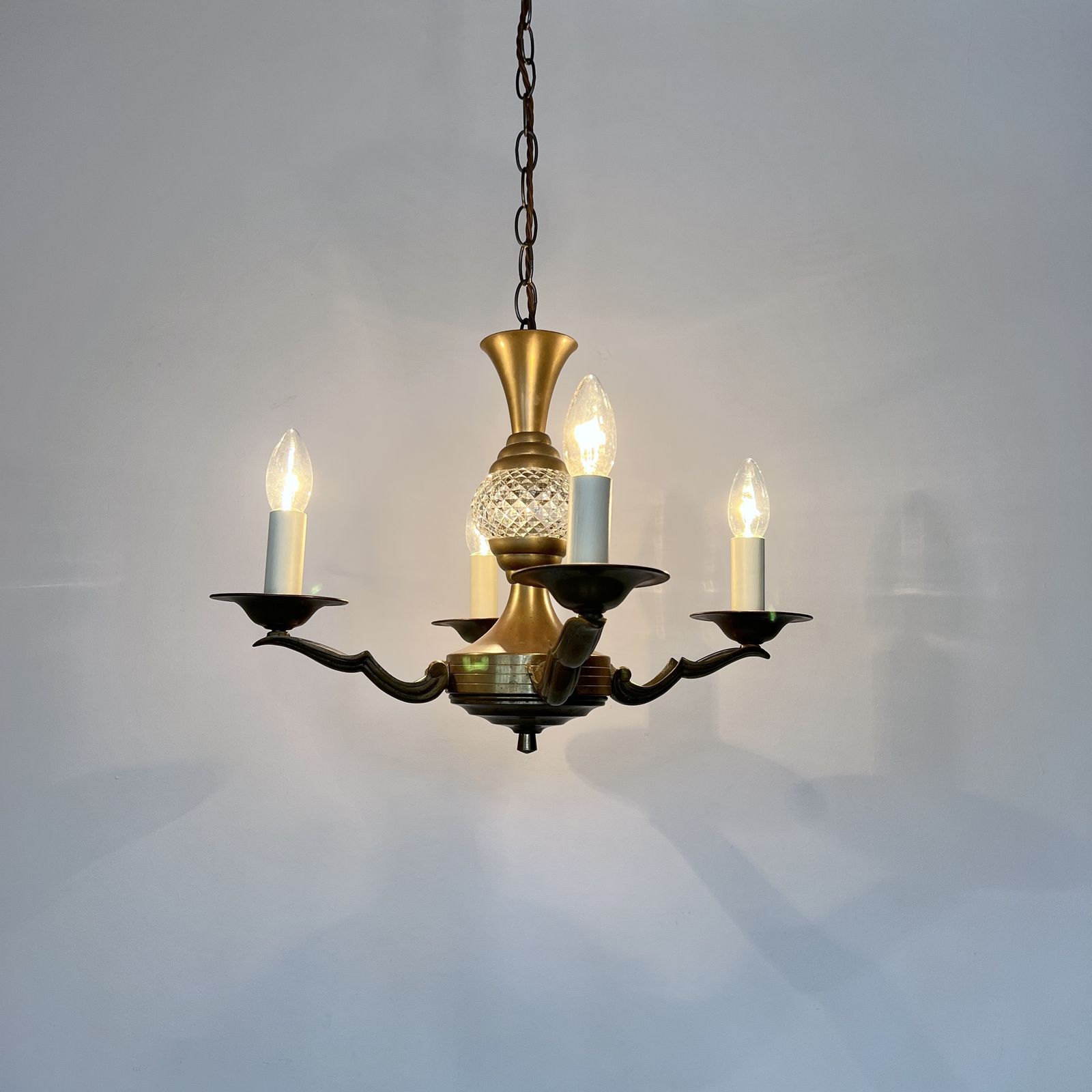 photo furniture Brass Four Arm Chandelier With Faceted Glass Stem Detail