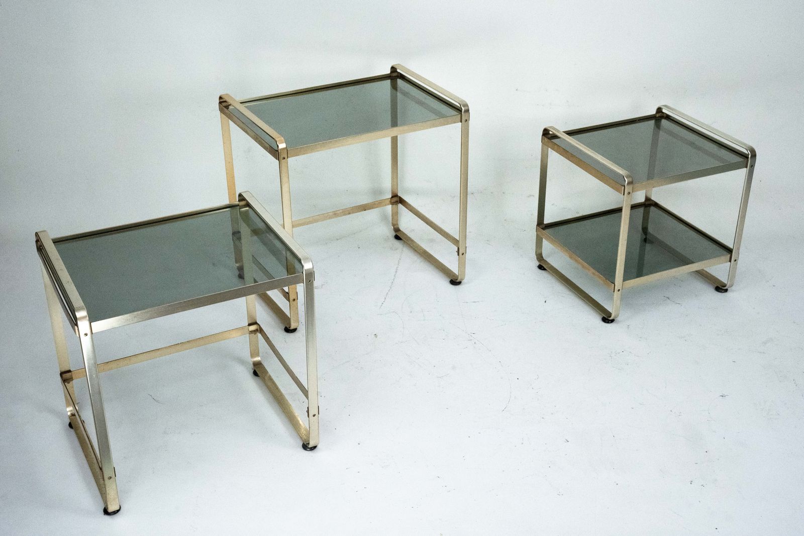 Set Of Three Nesting Side Tables In Gilded Aluminum And Glass – Italy, 1970s photo vinterior