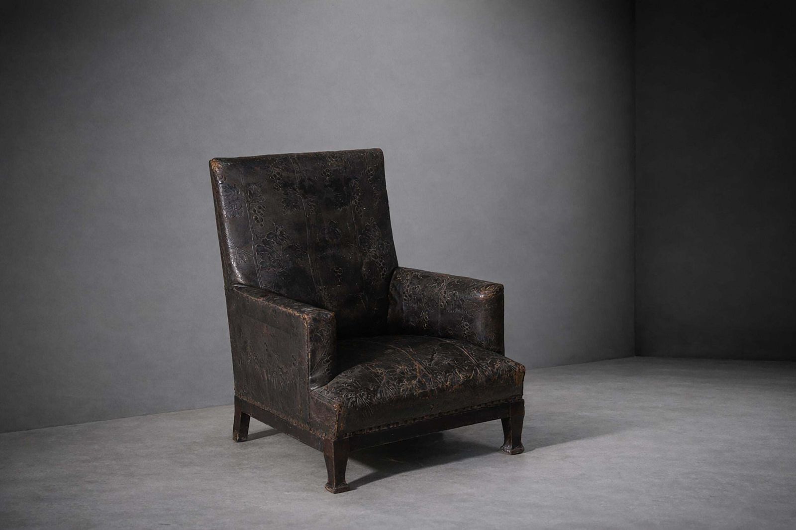 Antique Italian Art Nouveau Leather Armchair With Floral Decorations photo furniture