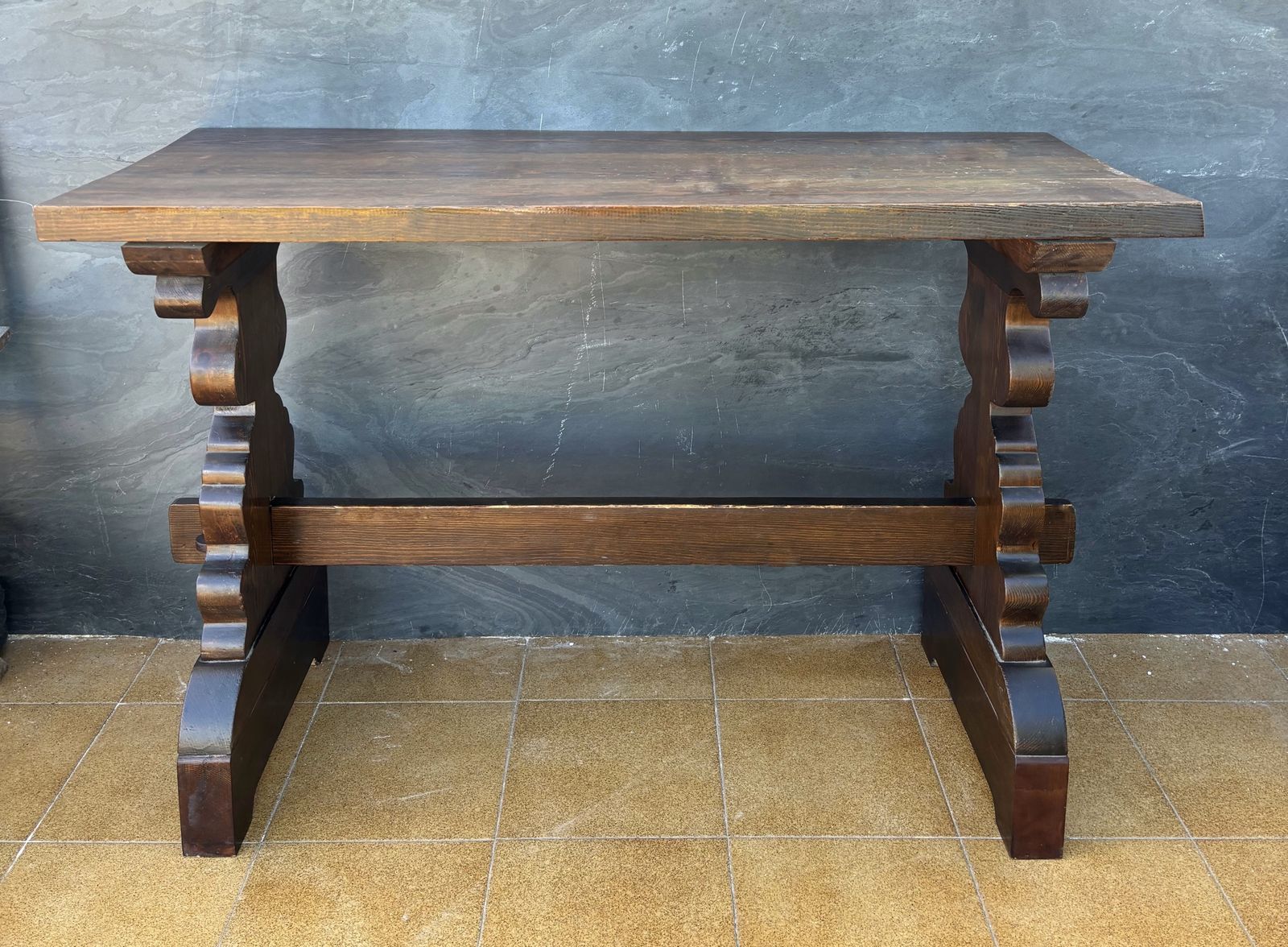 photo furniture Spanish Rustic Trestle Console Table With Carved Pedestal Supports, 1940s