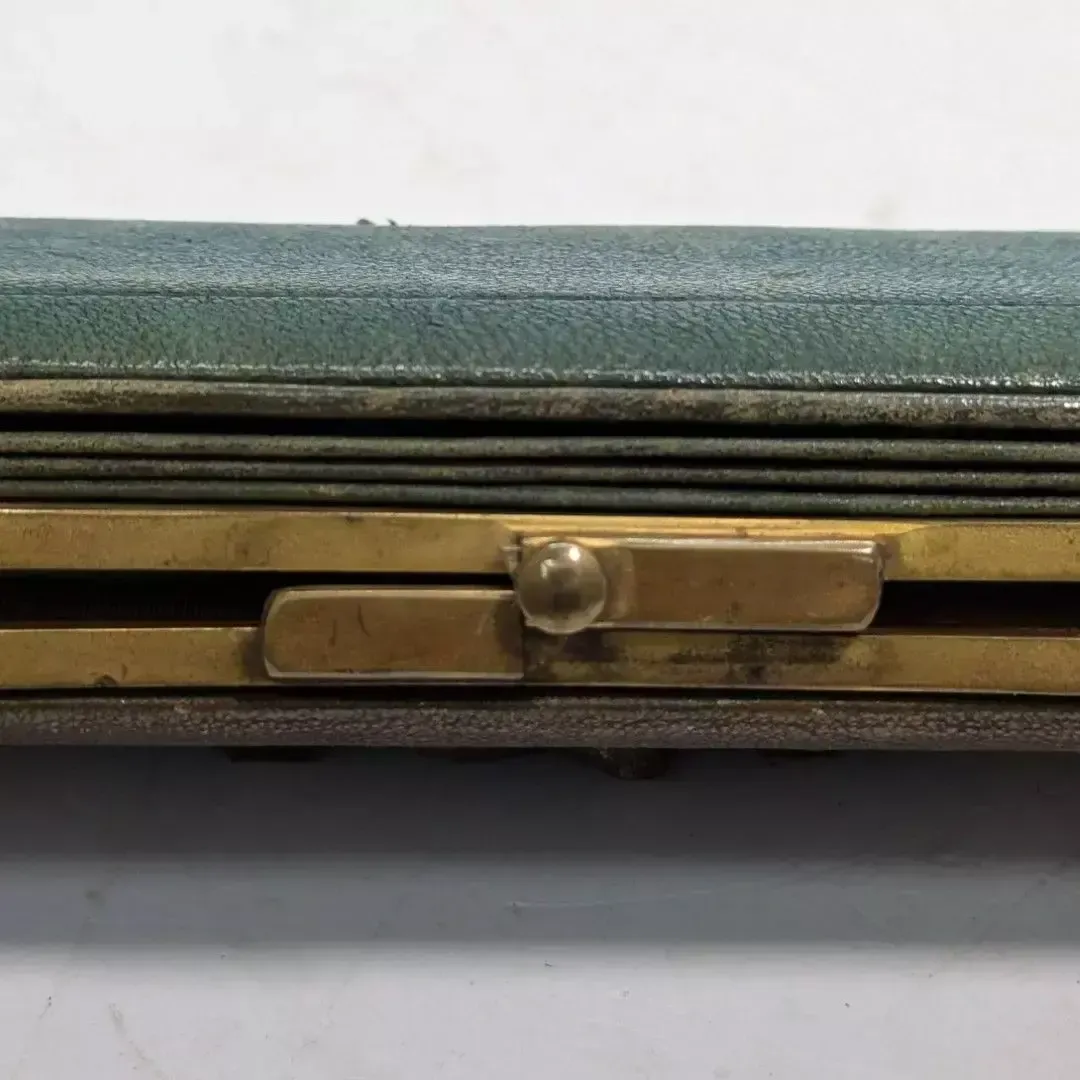 Green Moroccan Gusseted Box Containing A Pair Of Pliers photo 382.0